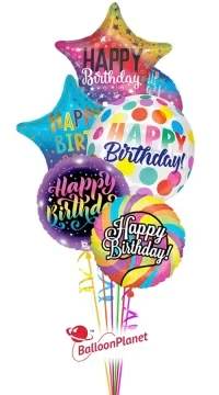 Cluster of colorful birthday balloons with printed messages.