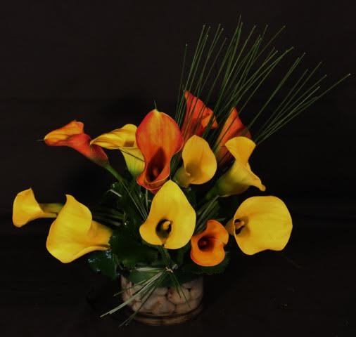 Calla Lilies in Glass Container  - Calla lilies in glass container 
