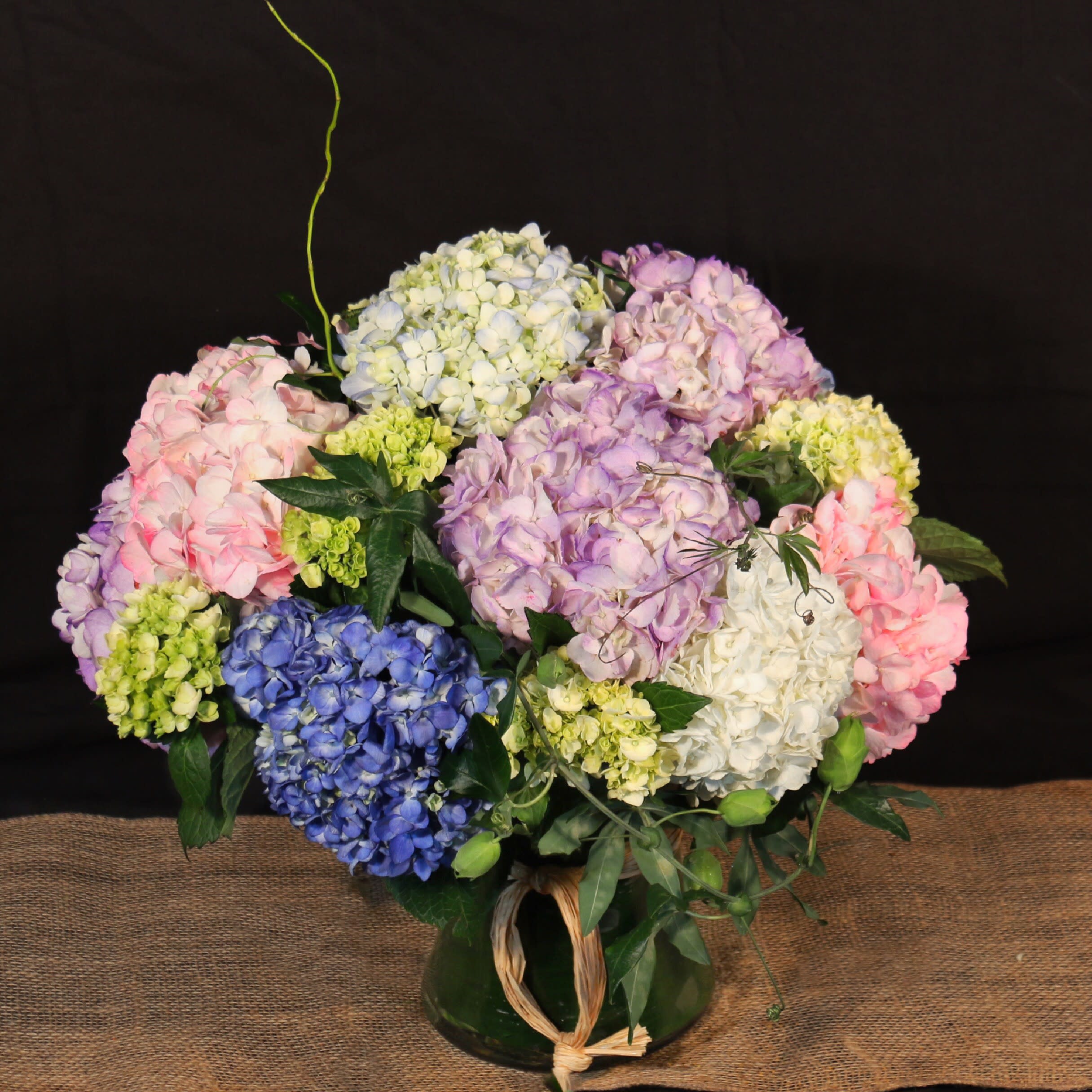 SEAMLESSLY ELEGANT HYDRANGEA  - MIX ASSORTMENT OF HYDRANGEAS IN BLUE, PINK,GREEN, AND WHITE. 