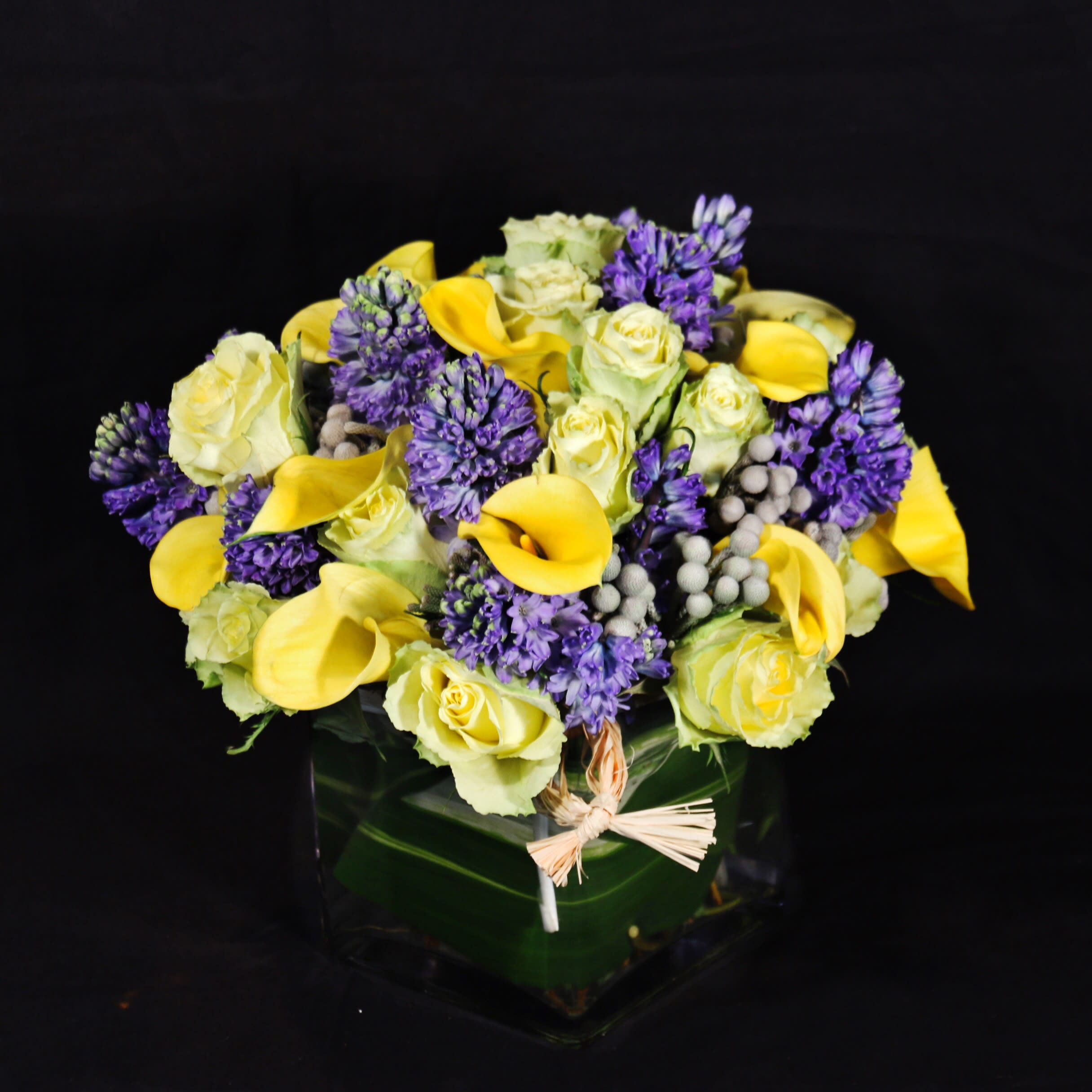 WILD AT HEART  - THE MOST HIGHLY SCENTED BLUE HYACINTH, YELLOW CALLA LILY, AND KIWI GREEN ROSES. 