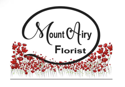 Mount Airy Florist logo with red flowers along the bottom