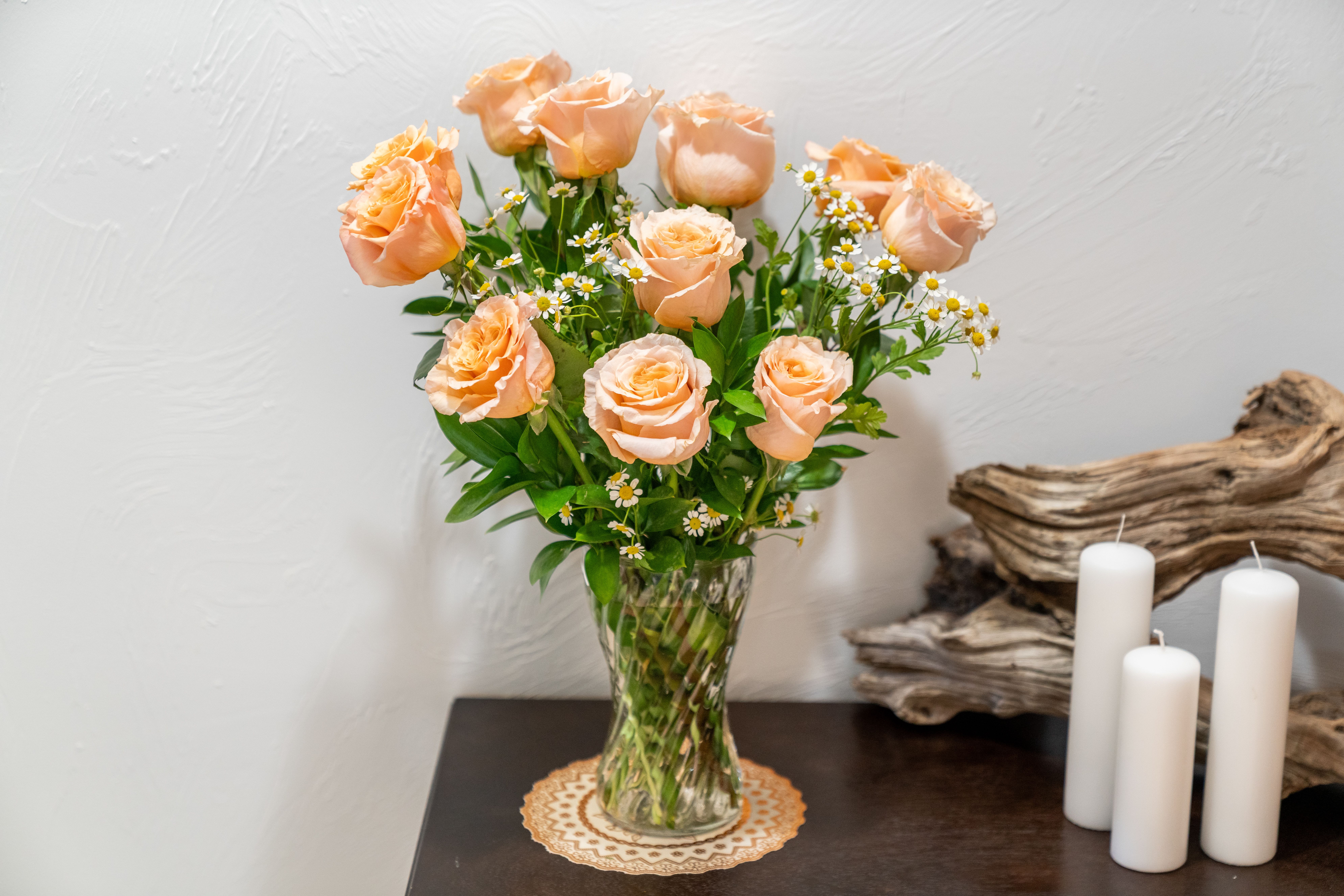 Pick Me Up  - This arrangement is the perfect "pick me up" to brighten someone's day. Dozen Long Stemmed Pastel Pink Roses is the perfect gift for a birthday, get well, just because, fun date night, or a thank you.    Arrangement Details: 12 Long Stemmed Pastel Pink Roses and Assorted Greenery APPROXIMATE DIMENSIONS: 25" H X 18" W