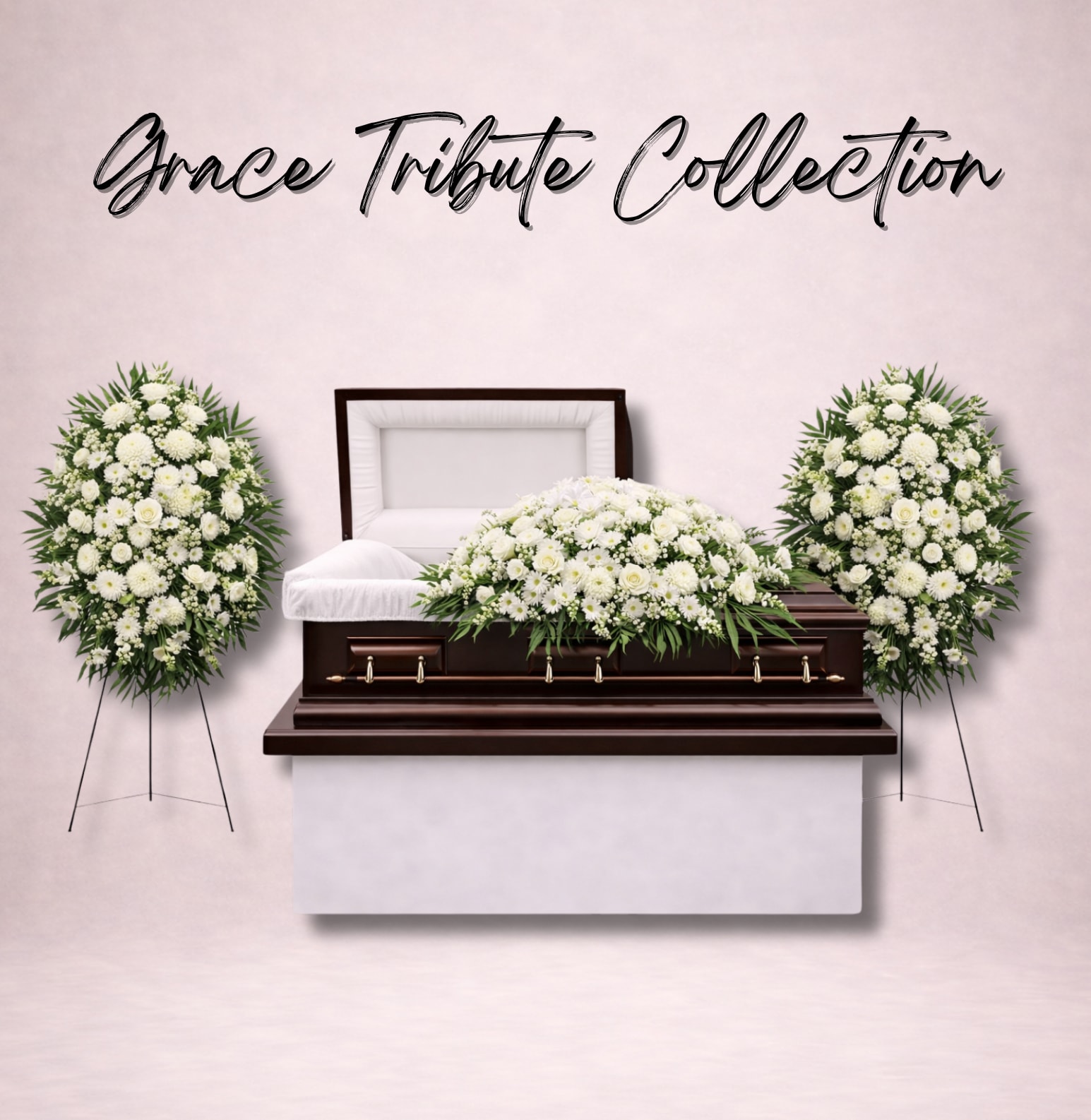 White funeral casket with white floral sprays and standing wreaths