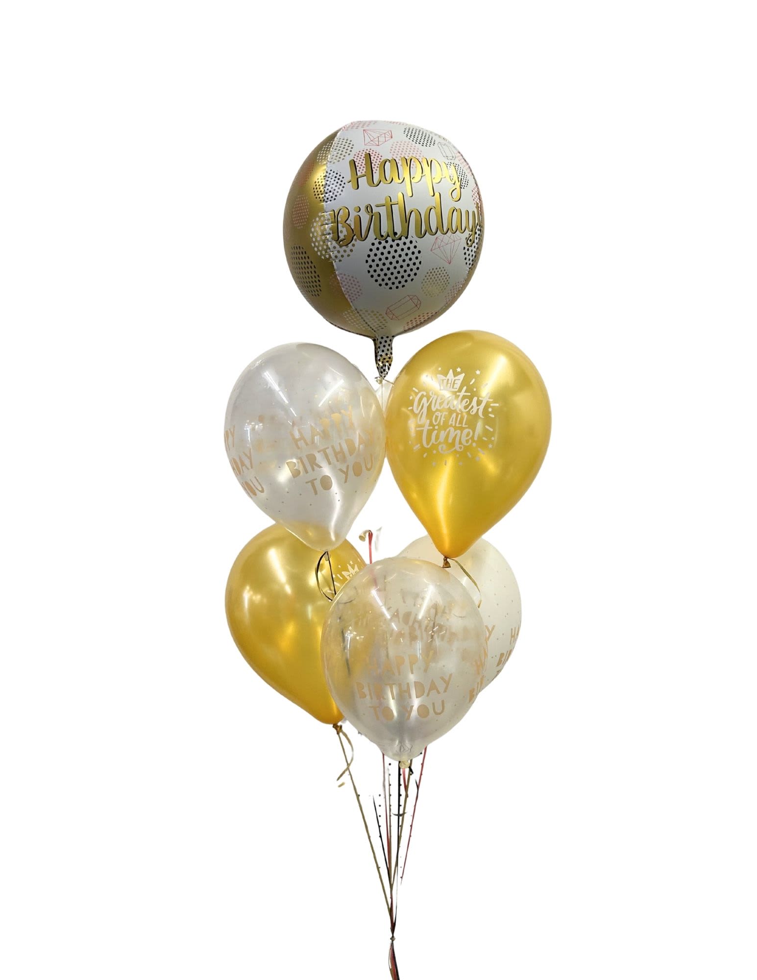 Cluster of gold and clear birthday balloons with printed messages