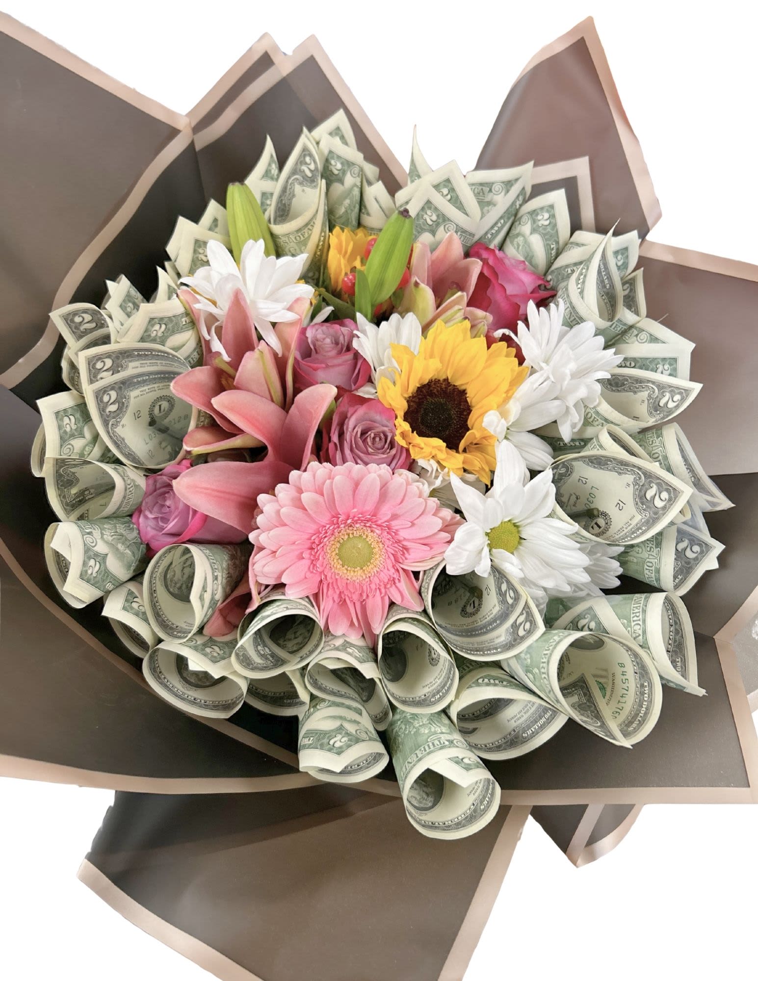 Bouquet of mixed flowers wrapped with rolled dollar bills
