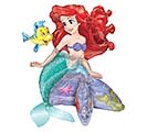 Mini Ariel Tabletop Mylar- DOES NOT FLOAT - A cheerful mermaid tabletop balloon arrangement in bright red, blue, purple and green that brings a playful splash to birthdays and kids' parties. The cartoon Ariel-style mermaid with her bright red hair and a little yellow-and-blue fish creates an instantly joyful focal point-perfect for a child who loves under-the-sea themes or a whimsical table accent that says "celebrate" without being fussy.  This compact arrangement is designed for tabletops and features layered blue, teal and purple tail tones against a clean white background, giving it a fun, illustrated look that reads well from across a room. Note: the mylar piece is a tabletop decoration and does not float, making it easy to place on party tables, gift tables, or dessert stations without helium.  Choose this piece when you want the birthday boy or girl to feel seen and delighted by a favorite character; it's a playful, low-maintenance way to tie together an ocean-themed party. Easy to position and ready to display as shown. DOES NOT FLOAT