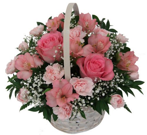 Pink roses and alstroemeria in a white basket with a handle