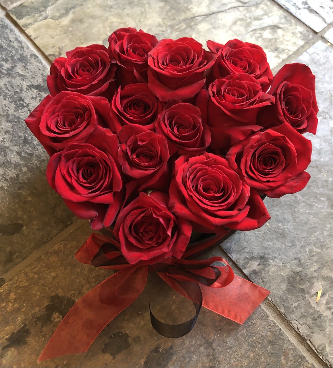Box of Roses - Red Roses in a Black Heart Shape Box. If Red is not THE color, let us know in the special instructions box what color is preferred. Denver Florist, LoHi Florist. Same Day Delivery if ordered before Noon Mountain Time.
