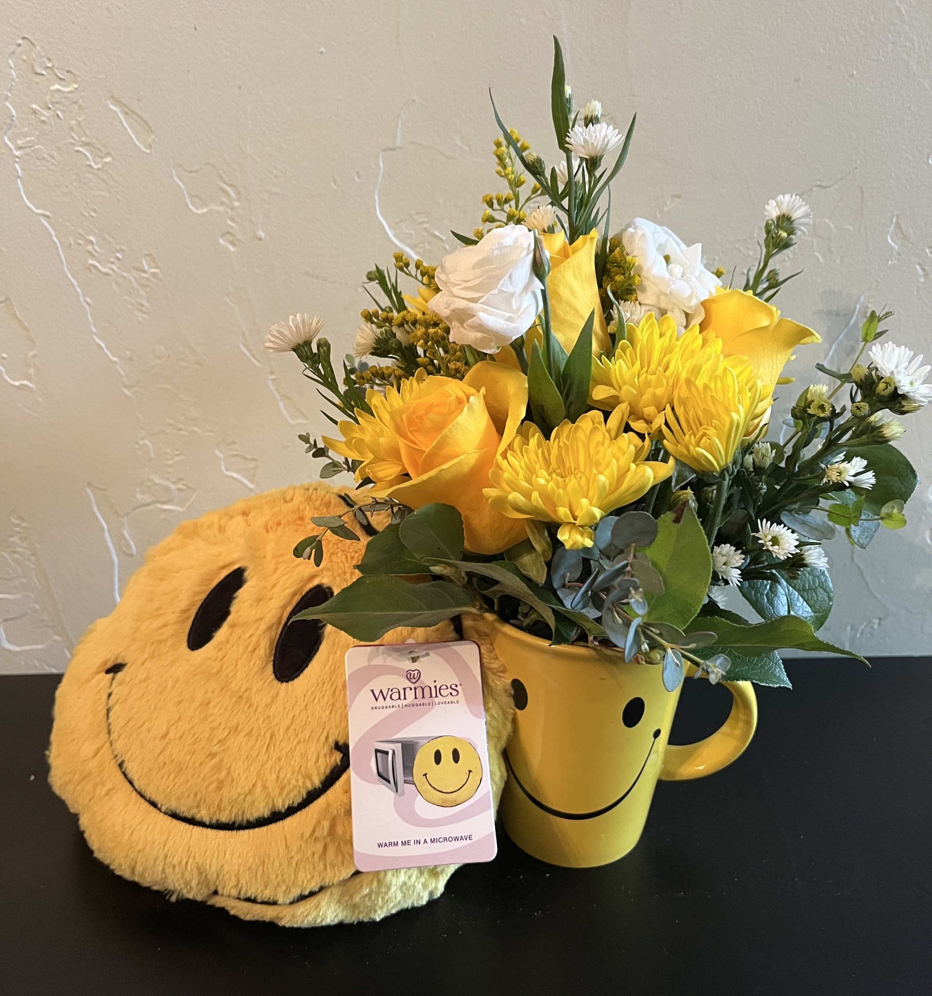 Happy Face - Floral arrangement in a Happy Face Mug along with a Smiley Face Warmie