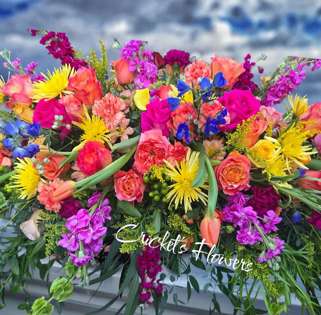 Bright mixed bouquet with roses, carnations, and yellow daisies