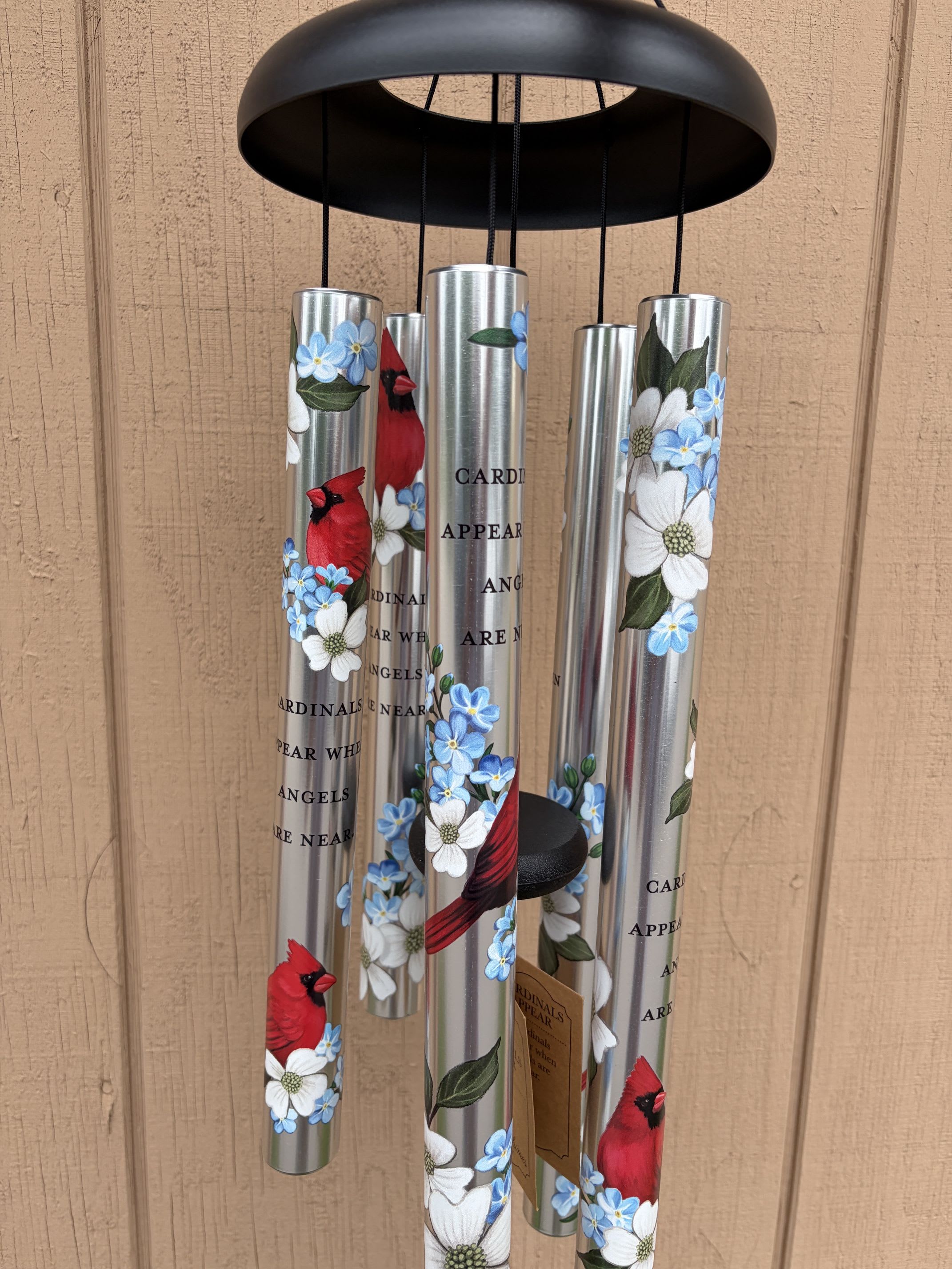 Wind chime "Cardinals Appear" - This beautiful aluminum wind chime features tubes printed with cardinals, a colorful floral design and the phrase “Cardinals appear when angels are near”. It measures 38” long x 8” wide (1 1/4” diameter tubes)