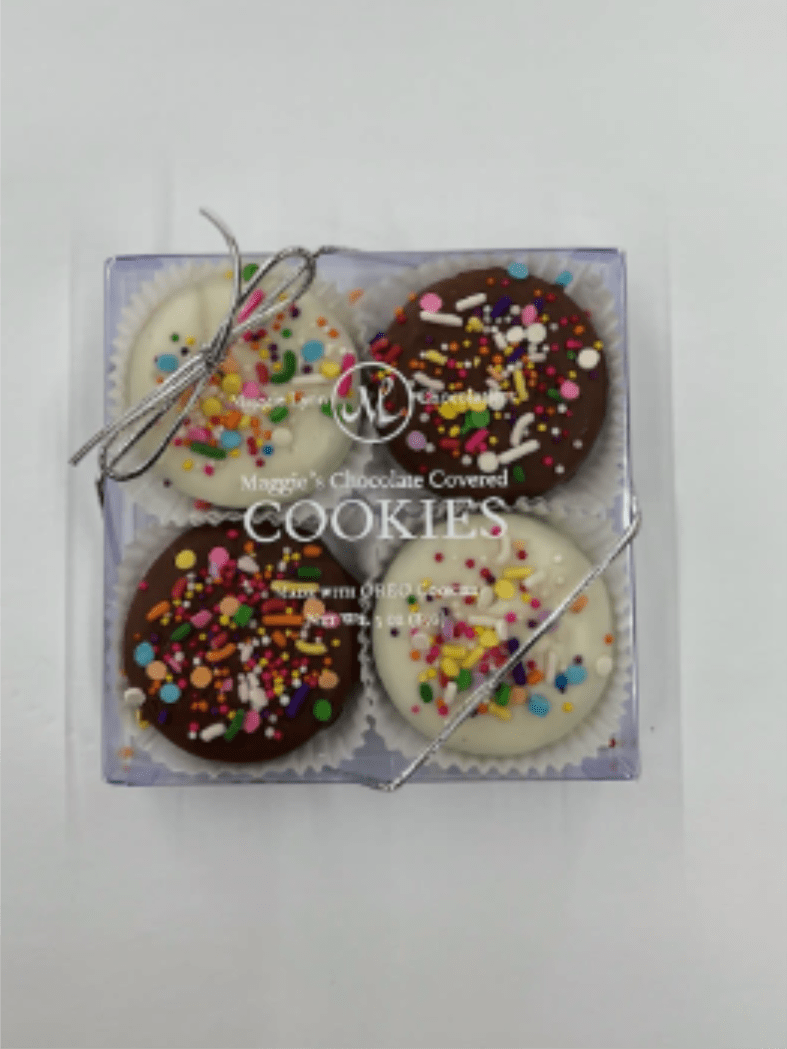 Box of four chocolate-covered cookies with colorful sprinkles
