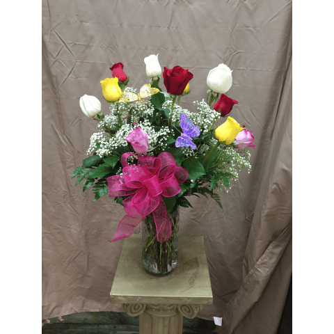  Dozen Multicolored Roses by Park Florist  - Our exquisite bouquet of magnificent, long-stem assorted colored roses, complements any occasion with unforgettable style. Because only the freshest roses are selected for this arrangement, actual rose colors will vary due to availability.  12-stem arrangement measures approximately 22"H x 15"L    SKU#: PFDozenMulticoloredRoses 