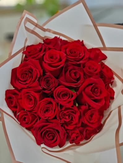 Wrapped Bouquet of 24 Red Roses - Give that someone special a beautiful bouquet of 24 red roses all wrapped up to impress.