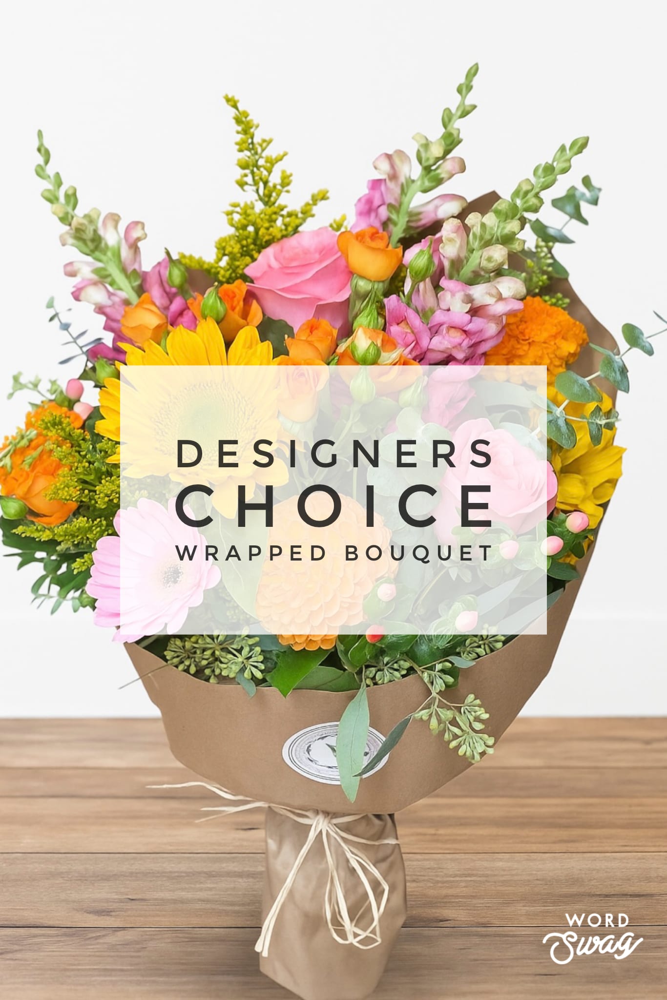 Wrapped bouquet of pink, orange, and yellow flowers