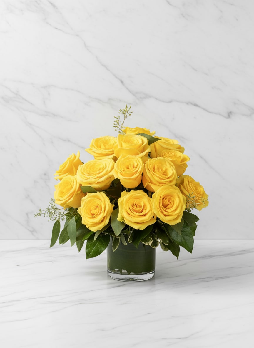 Sunny Yellow Roses - Bring a burst of sunshine to any room with our Sunny Yellow Roses arrangement. This radiant bouquet features one dozen yellow roses artfully arranged in a modern glass vase with lush greenery. Perfect for brightening someone’s day, celebrating a special occasion, or adding warmth to your home décor, these roses symbolize friendship, joy, and new beginnings.  Each arrangement is handcrafted by our expert florists in San Francisco, ensuring the highest quality and freshness. Whether you’re sending flowers for a birthday, thank-you gift, or simply to spread positivity, Sunny Yellow Roses delivers happiness in full bloom.
