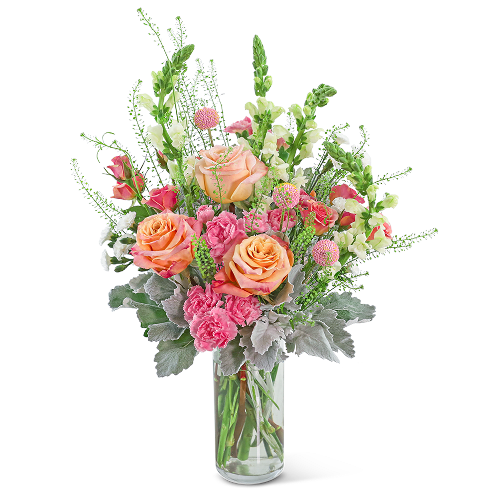Rosy Coral Breeze - Capture the essence of romance with Rosy Coral Breeze, an enchanting flower arrangement in a clear vase. Featuring a stunning mix of Roses, Carnations, Solomio, Craspedia, Snapdragons, and premium foliage, this elegant design is guaranteed to delight any recipient and add a touch of warmth and beauty to any space, making it a perfect gift for expressing love and admiration.