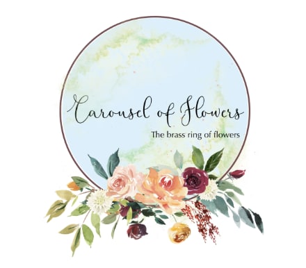 Circular floral logo with roses and greenery around the bottom