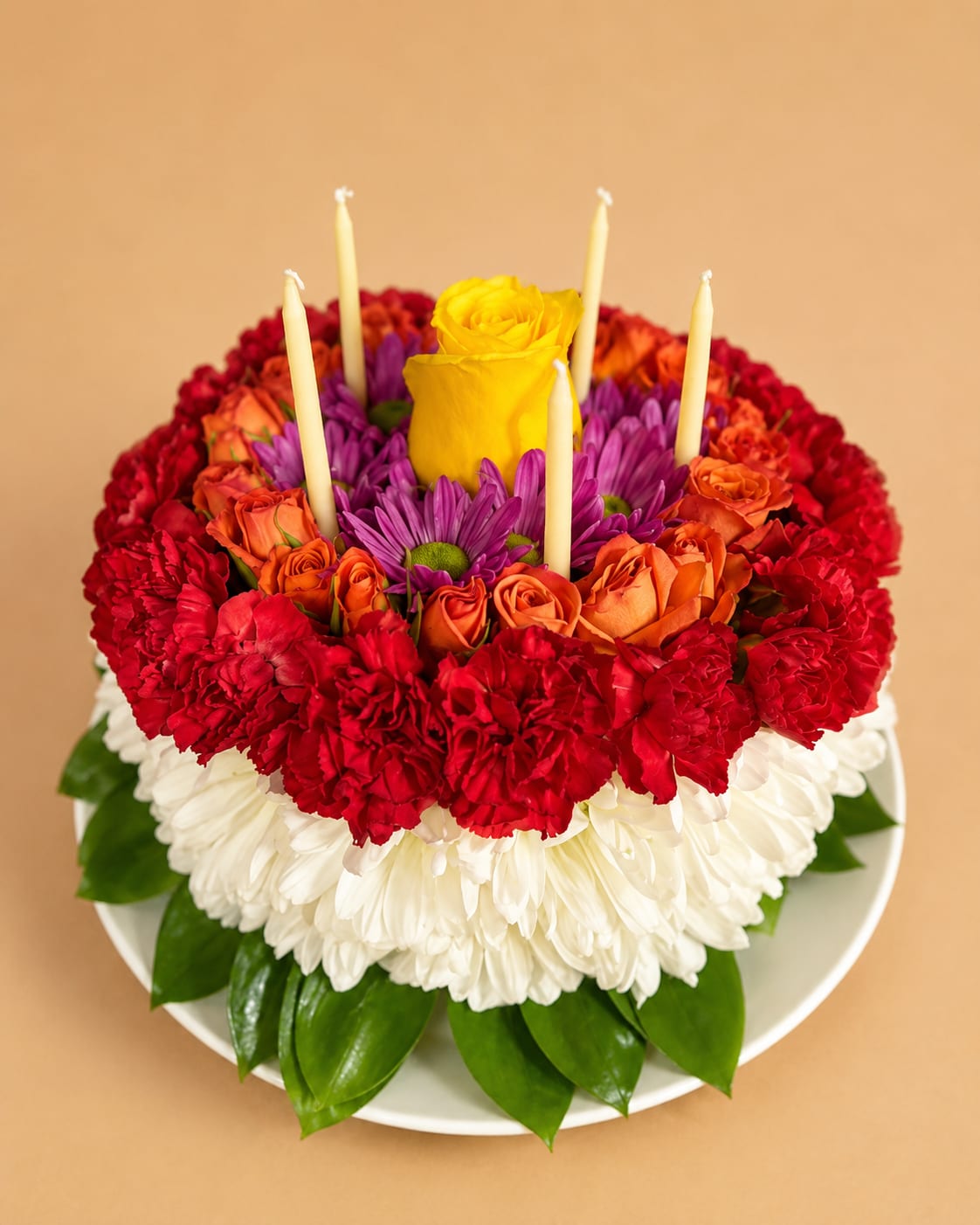 Birthday Pastel  - Our Birthday Pastel is a colorful bouquet of roses and mums, topped with birthday candles, is sure to delight them on their special day! Please know thiis birthday pastel-inspired floral arrangement is not intended for consumption.