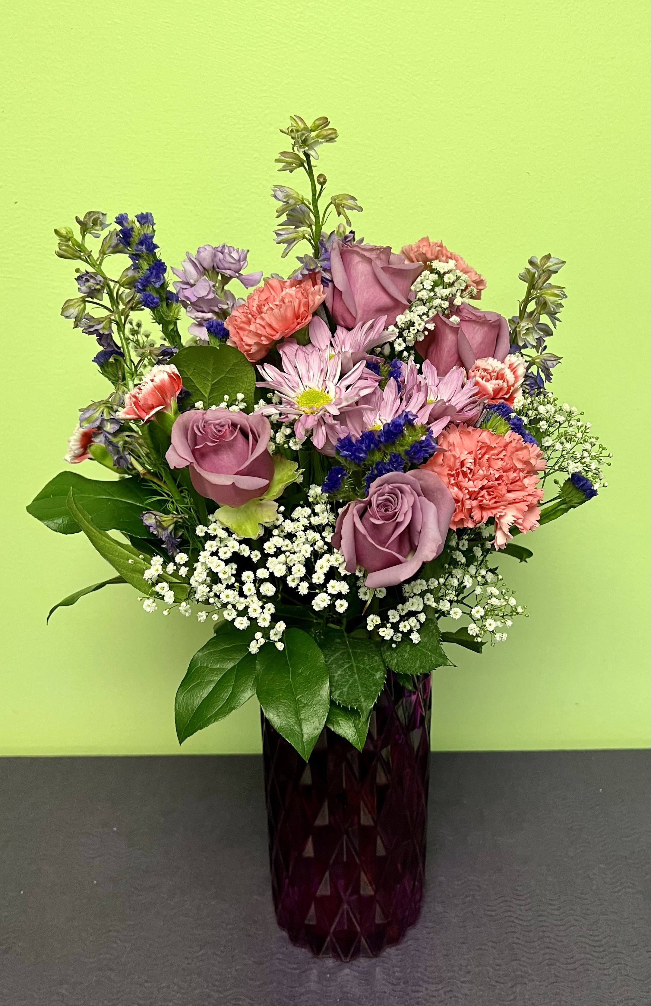 Amazing Mom Amethyst Vase by Teleflora  - This gorgeous purple vase has a unique design that will go perfect in mom’s vase collection. 
