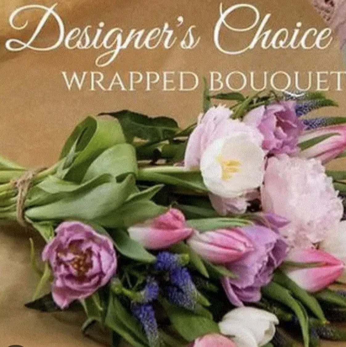 Wrapped bouquet of pink and white tulips with purple flowers