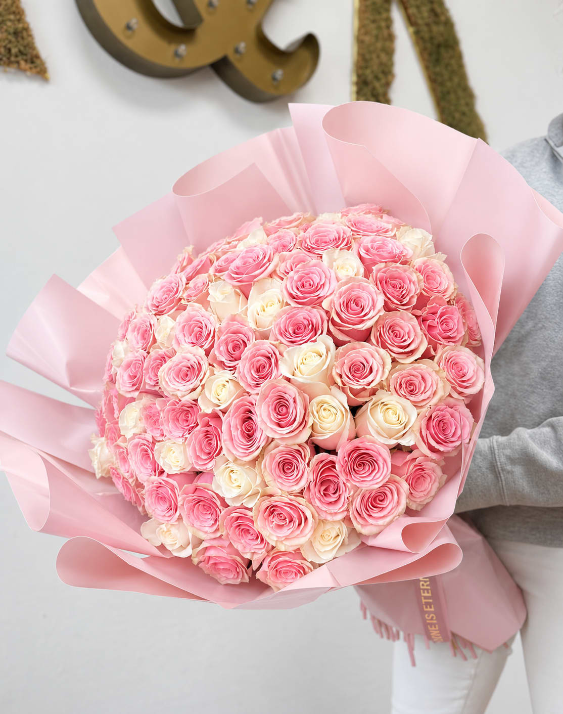 PROMO Roses Bouquet Pink and White - 100 long-stem pink and white roses with decorative wrapping paper. One hundred roses bouquets come WITH a clear vase.