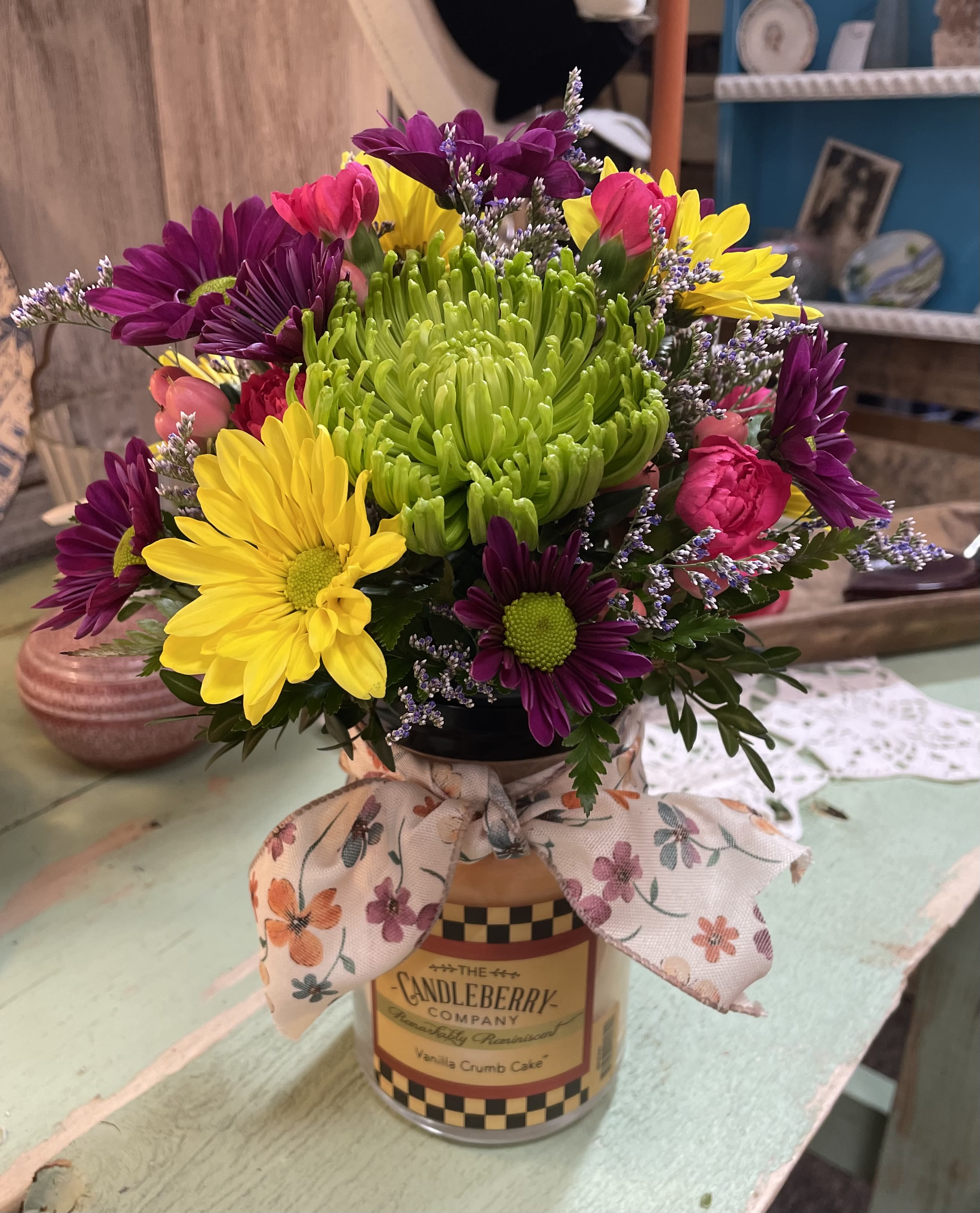 CandleBerry Celebration  - Our signature CandleBerry candle topped with fresh blooms. 