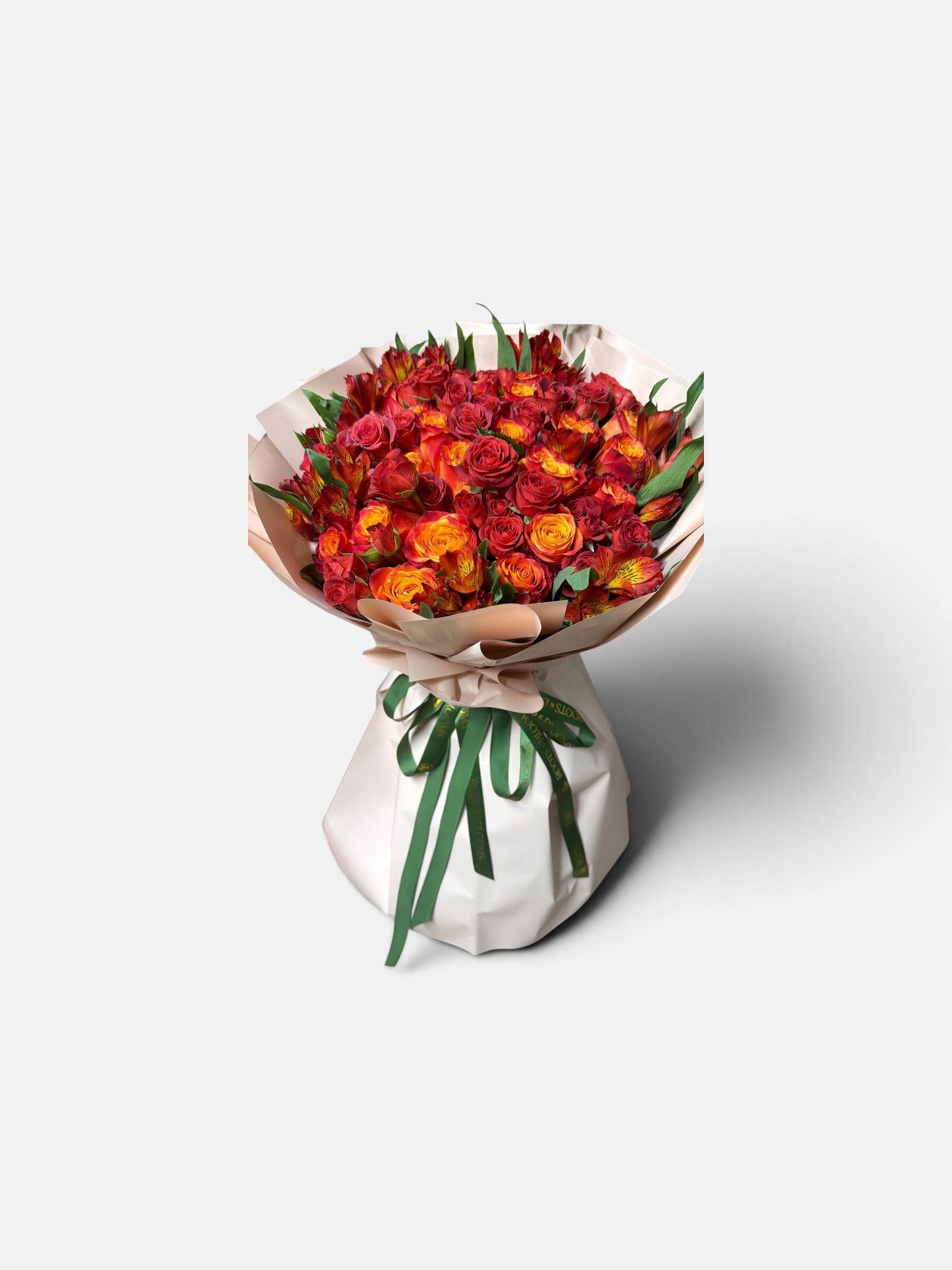 Crimson Fire Bouquet - A striking, full-bodied bouquet featuring rich red roses, vibrant orange booms, and warm sunset tones, artfully wrapped in a modern presentation.