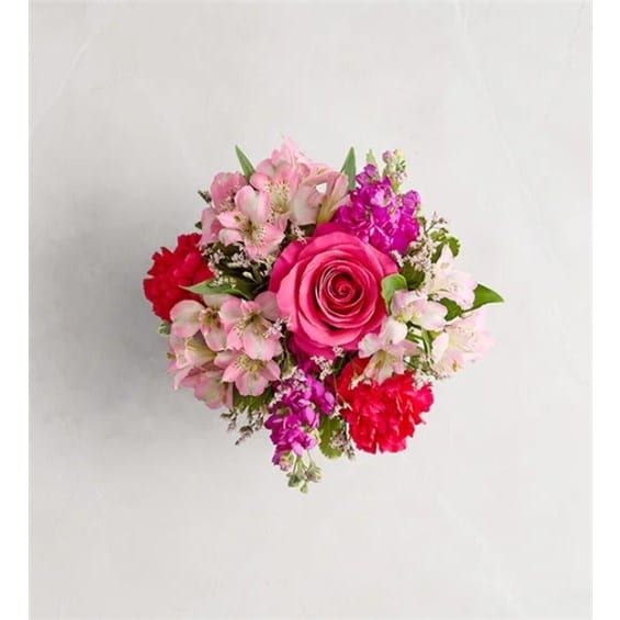 Pink rose bouquet with mixed pink and red flowers