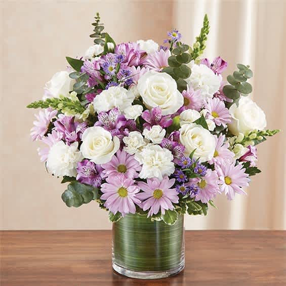 Pink and white mixed bouquet in a glass vase