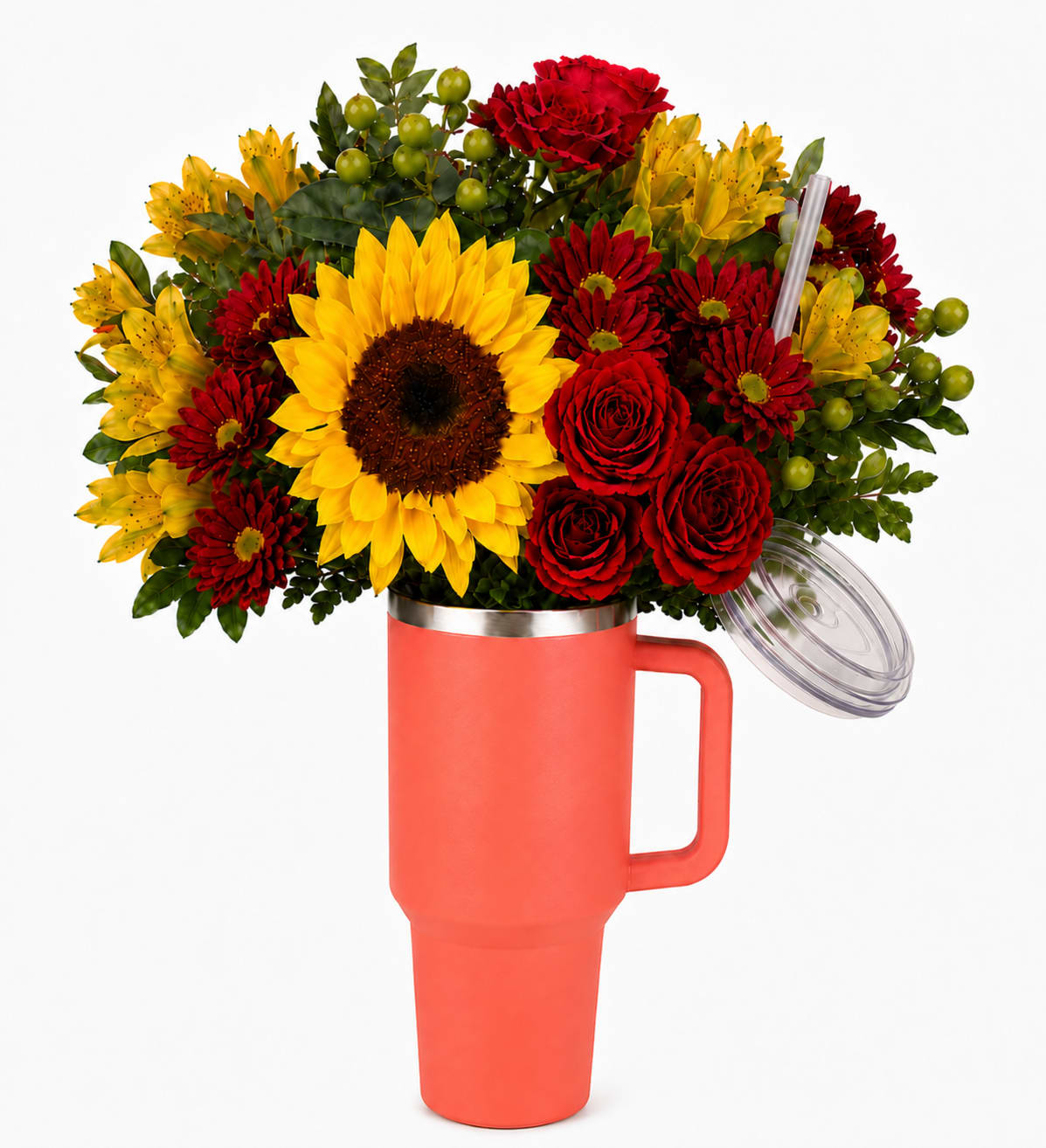 Bouquet of red and yellow flowers in a coral tumbler vase with lid and straw