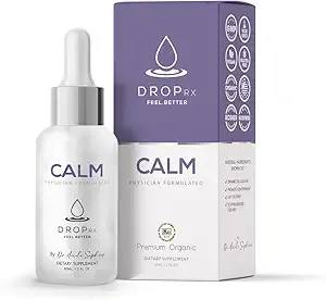 White dropper bottle beside a purple product box