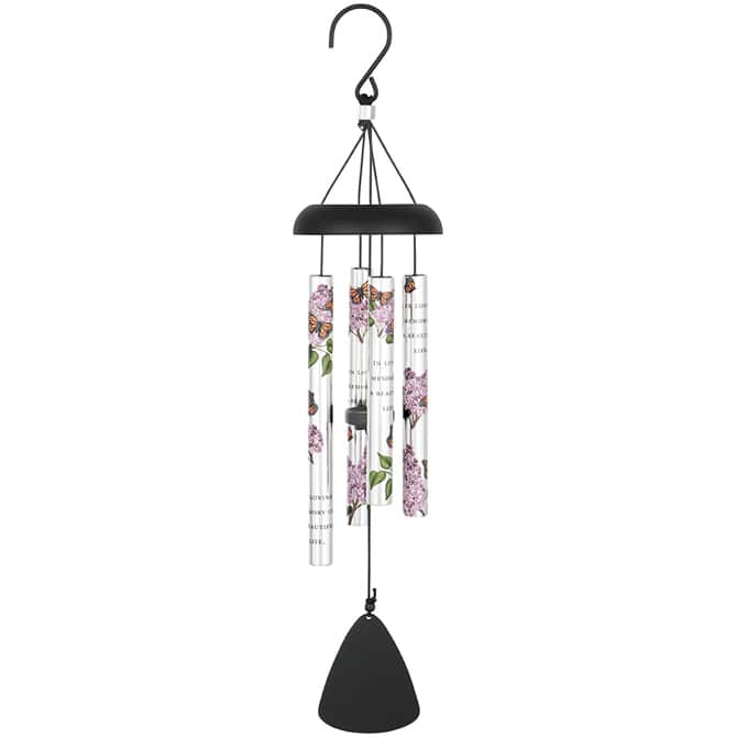 Black hanging wind chime with floral-printed tubes and a bell