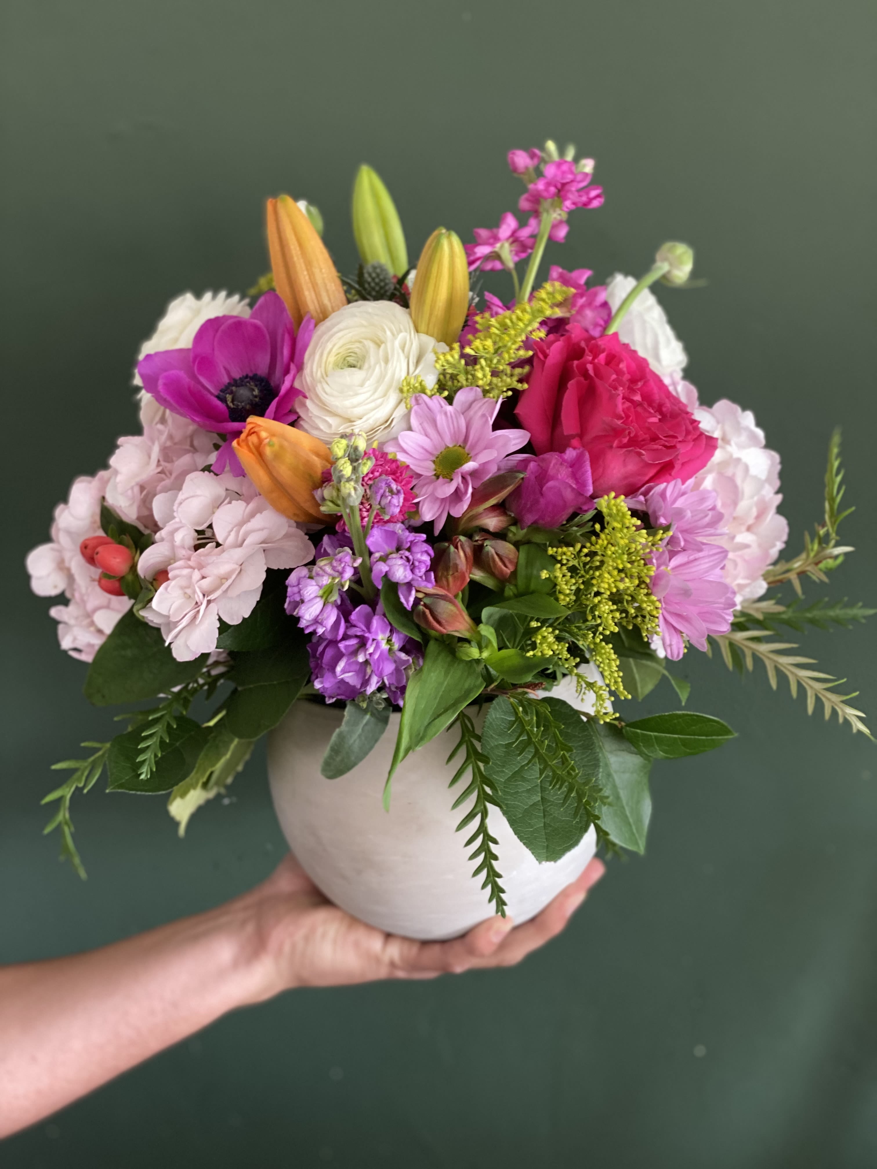 Mixed pink and white bouquet in a white vase