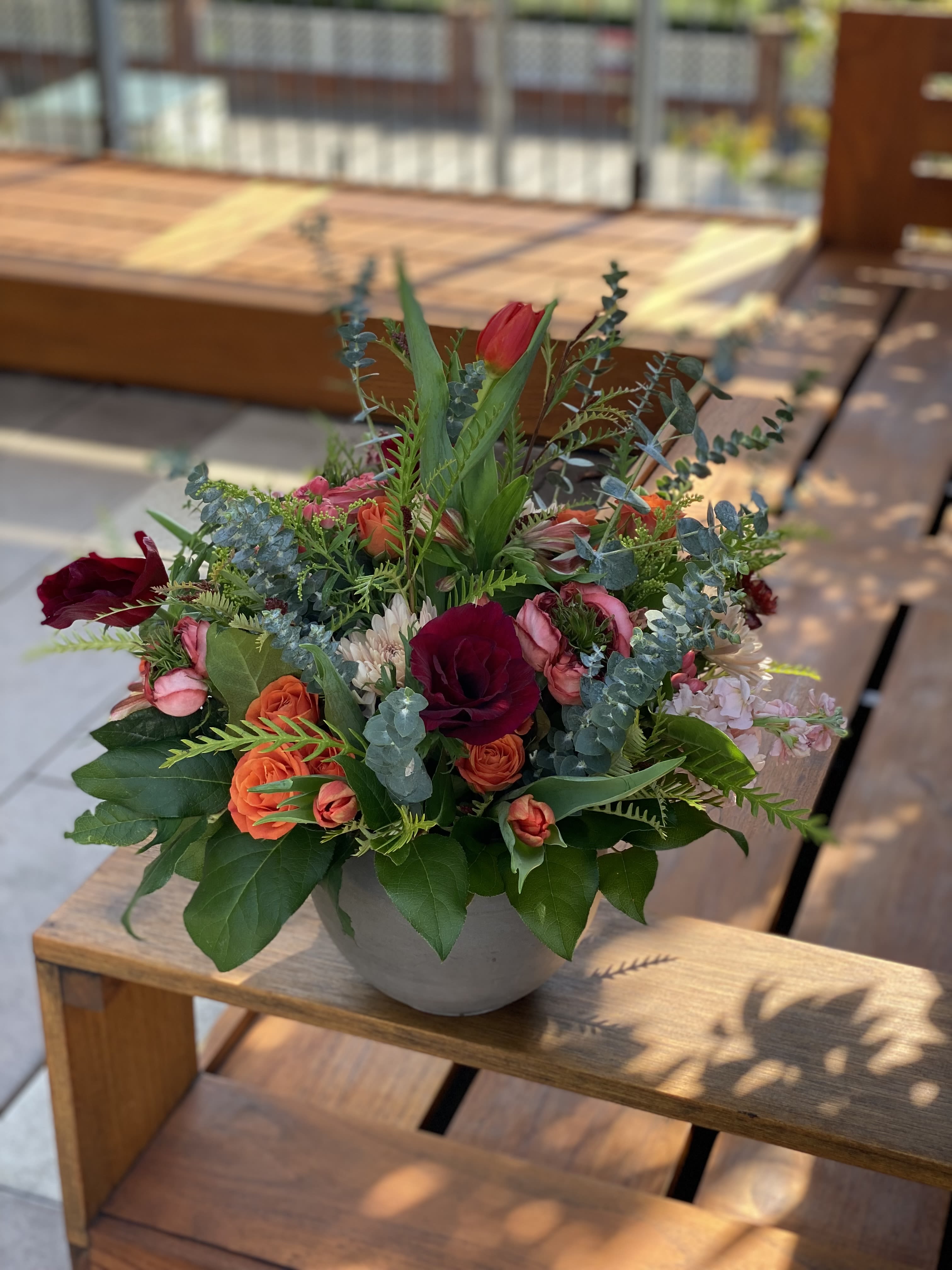 Shwenzy  - Ceramic pot filled with fresh eucalyptus, roses, spray roses, tulips and much more. 