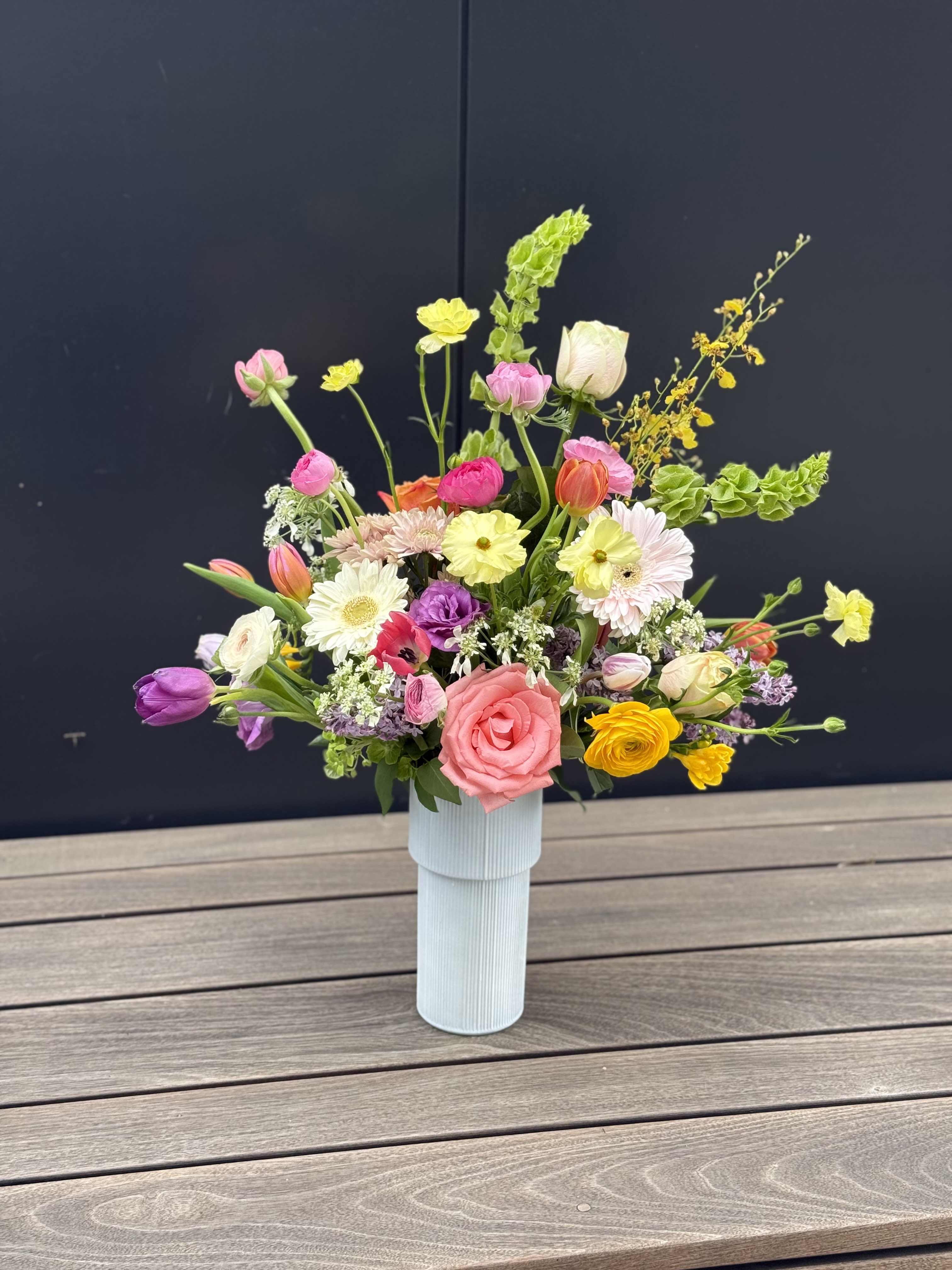 Blooms in spring… - Beautiful spring blooms arranged in white vase 