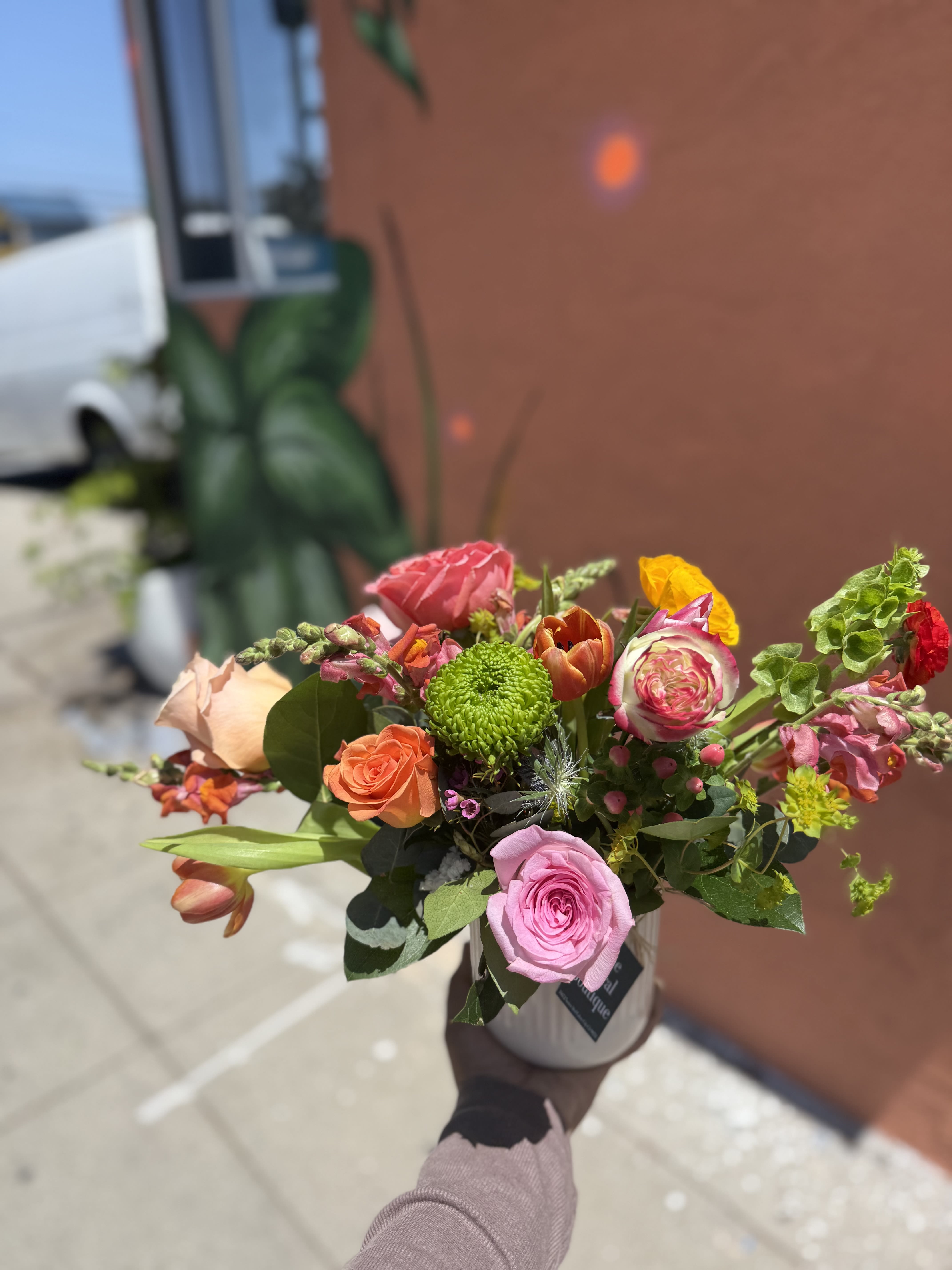 Bright Venice  - A bright, garden-fresh arrangement that says "you're the best"-this #1 mom arrangement is a cheerful Mother's Day or birthday gift that will make her feel celebrated. Comes in a ceramic short vase 