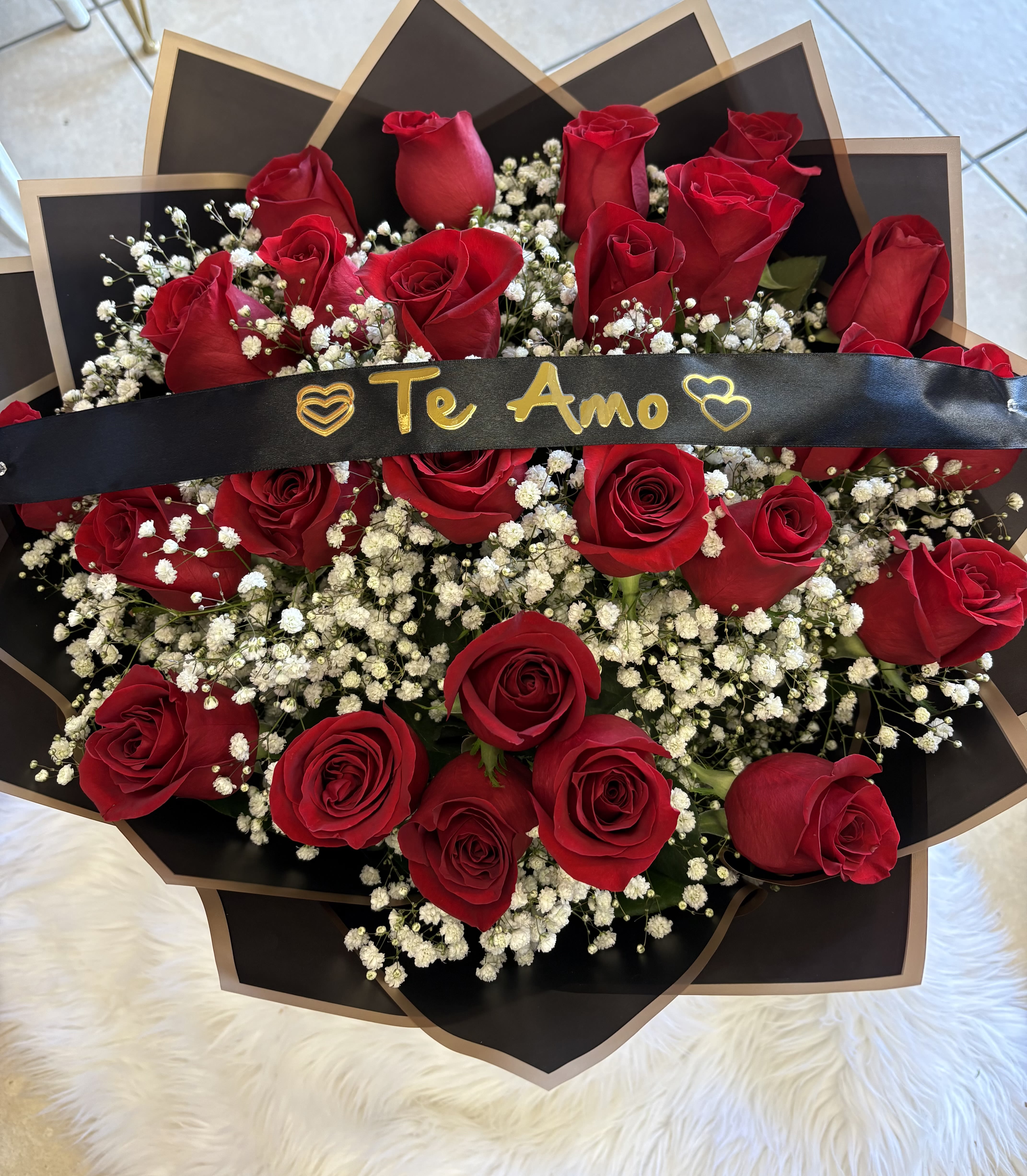 Te Amo  - 24 long Stem Roses wrapped in a buchon style, Banner can be changed to I Love you if preferred (please request under special instructions when placing the order)  