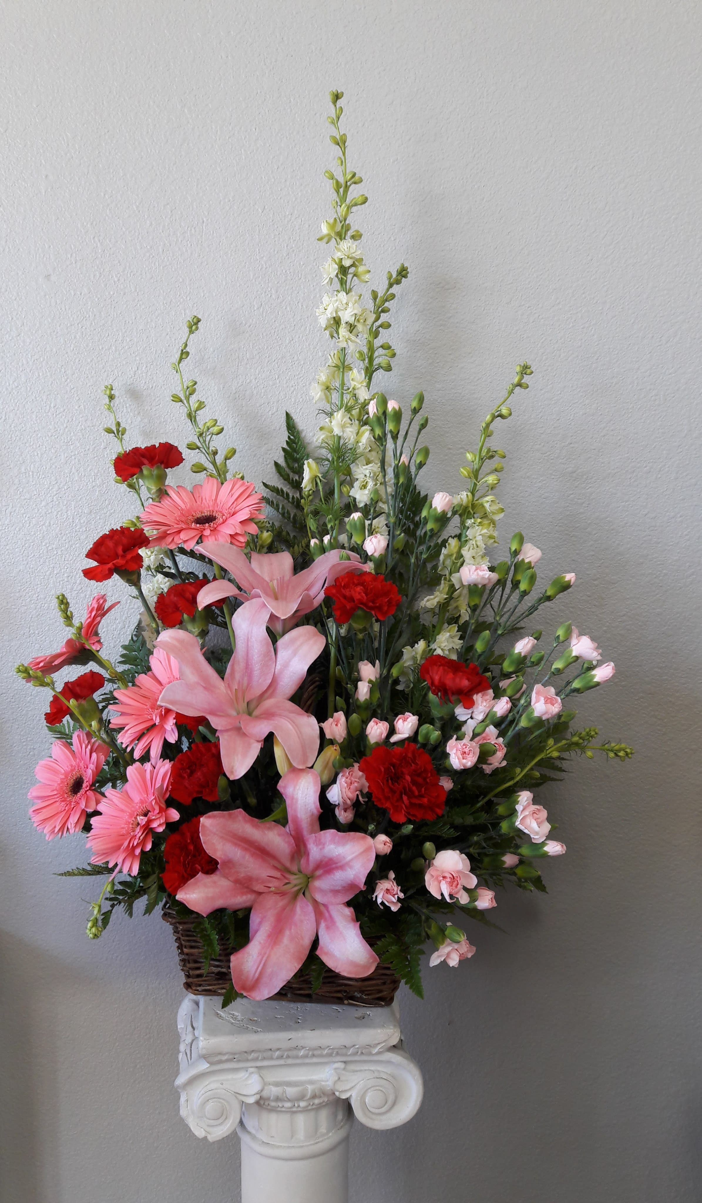 Perfect Petals -  this lovely arrangement of pink, red and white blossoms – including carnations, gerbera daisies and more – will add joy to someone’s day.