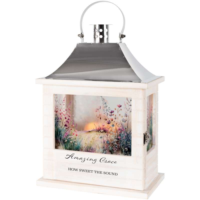 White lantern with floral artwork and the words Amazing Grace
