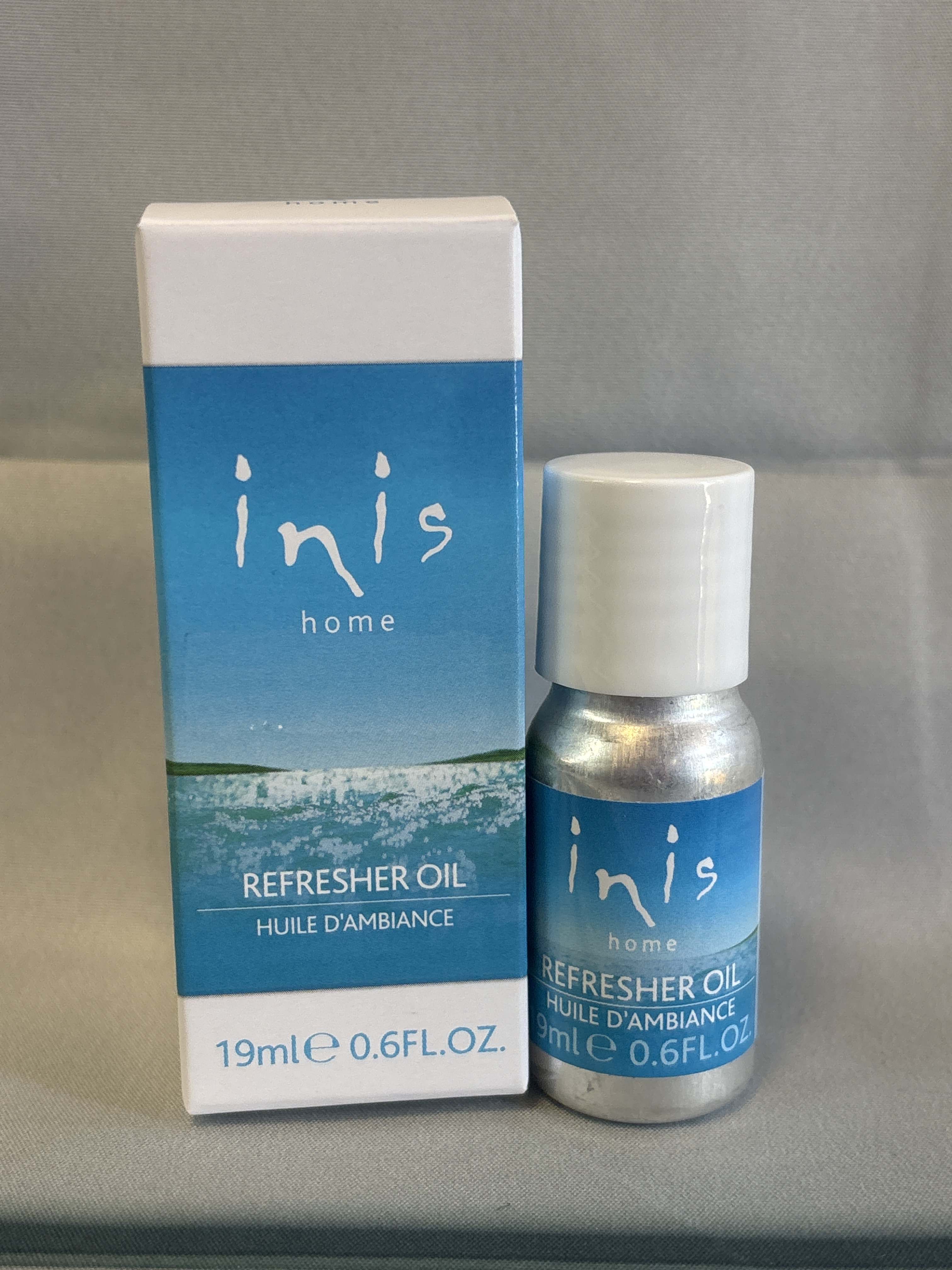 A small bottle and box of Inis home refresher oil