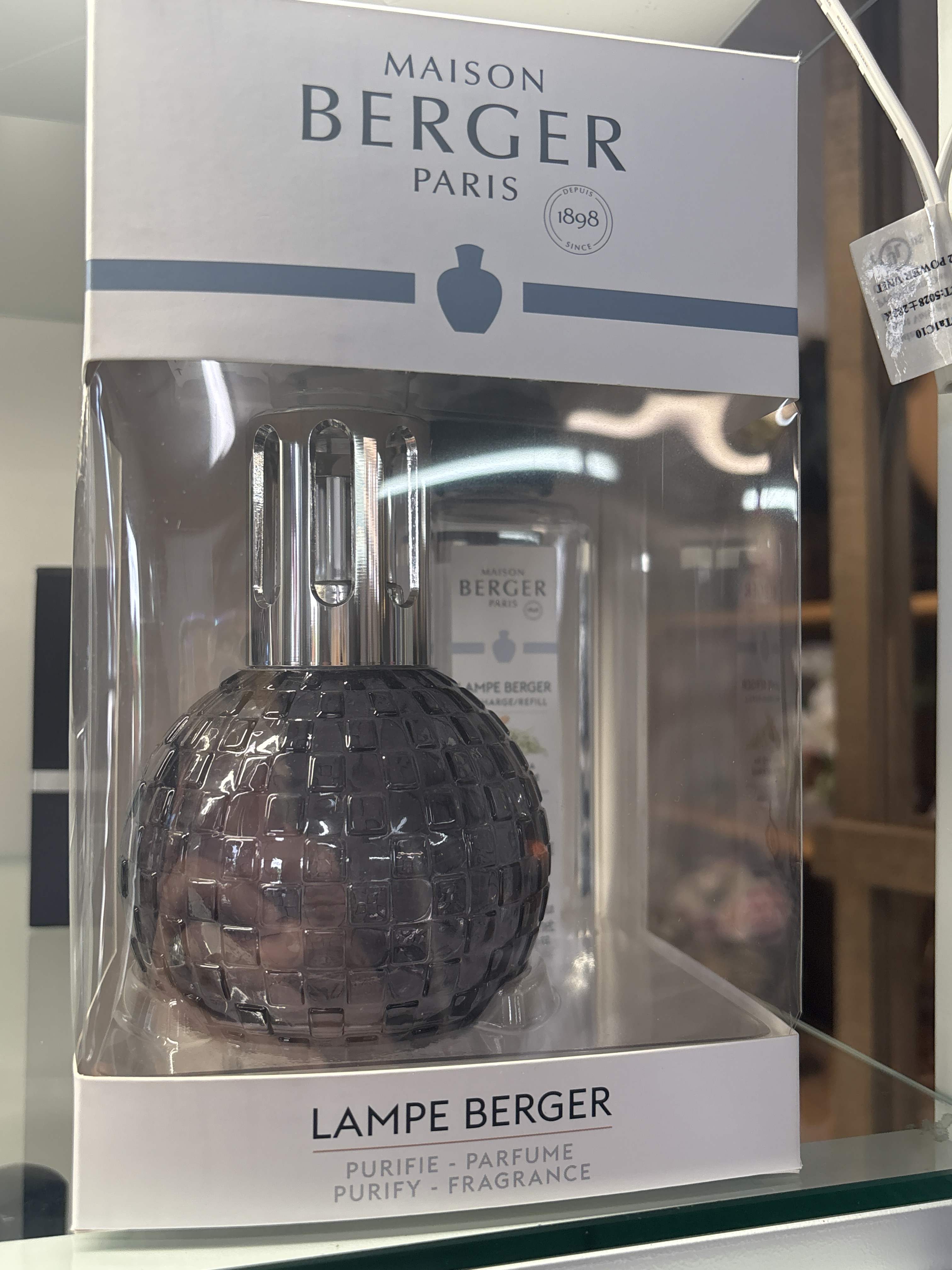 Boxed Maison Berger fragrance lamp with a dark glass bottle