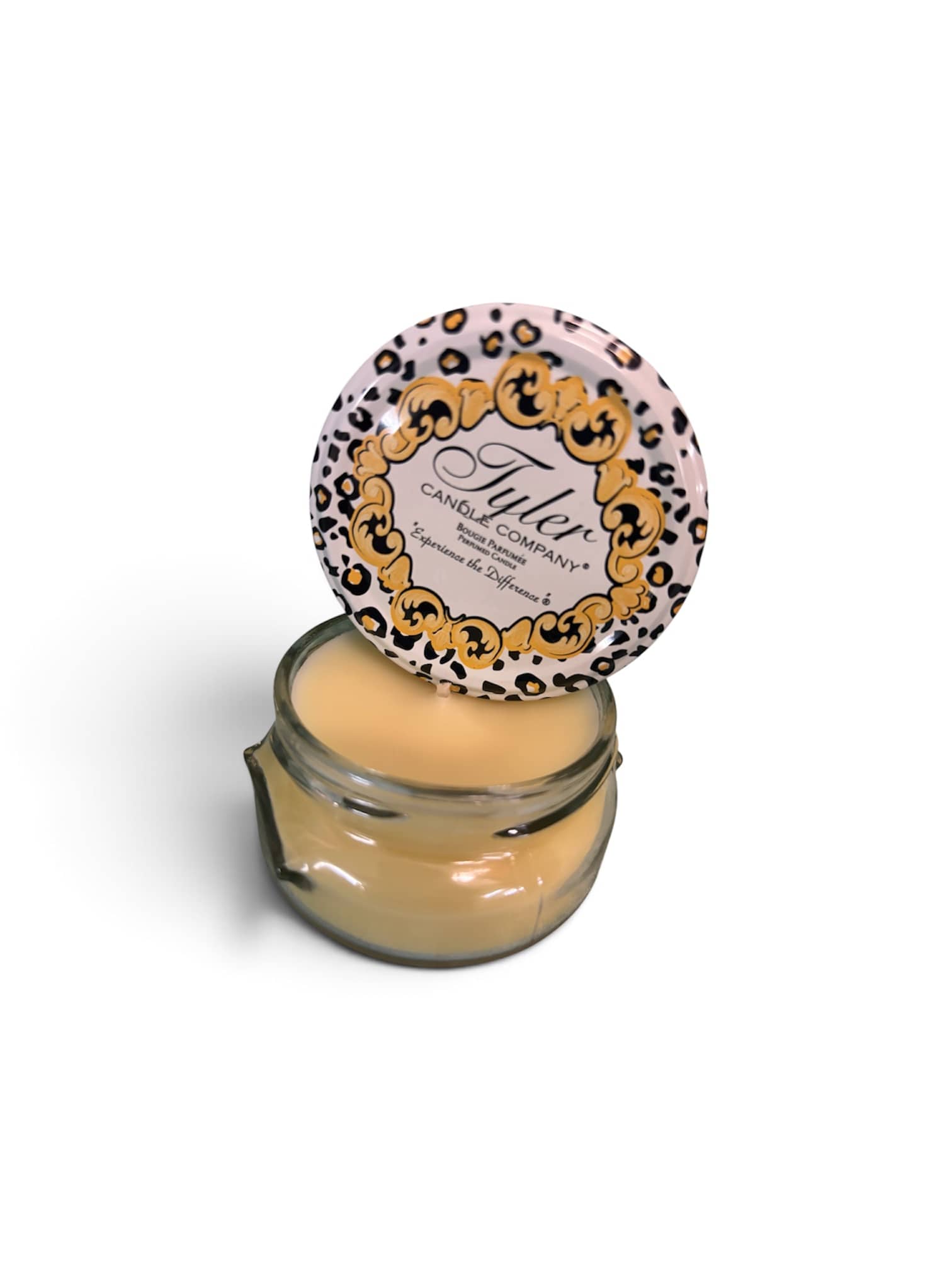 Glass jar candle with a leopard-print lid