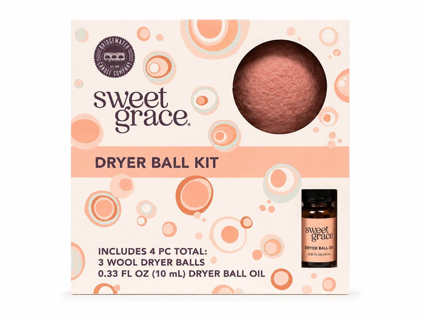 Boxed dryer ball kit with a wool ball and small oil bottle