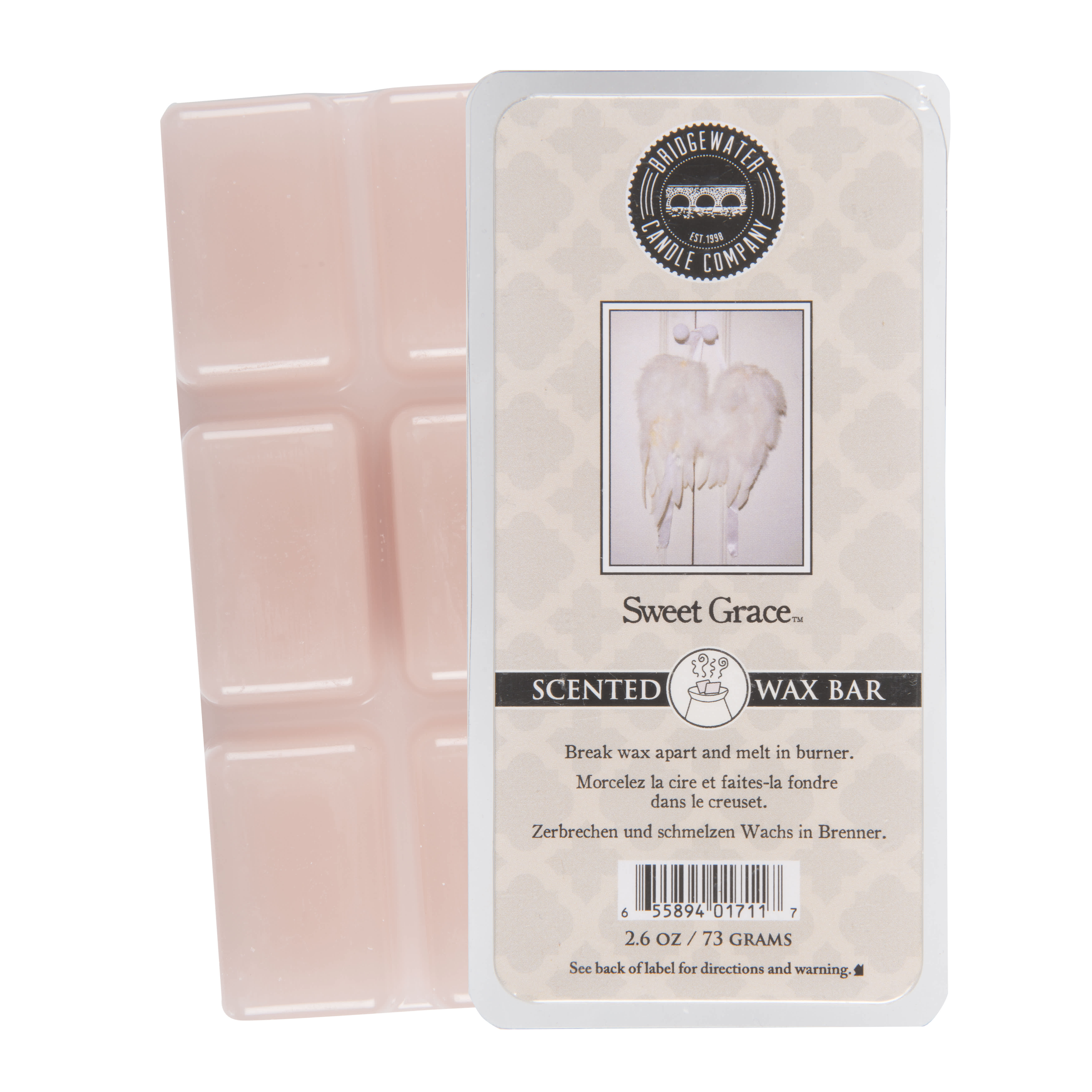 Pink scented wax bar in plastic packaging with a label