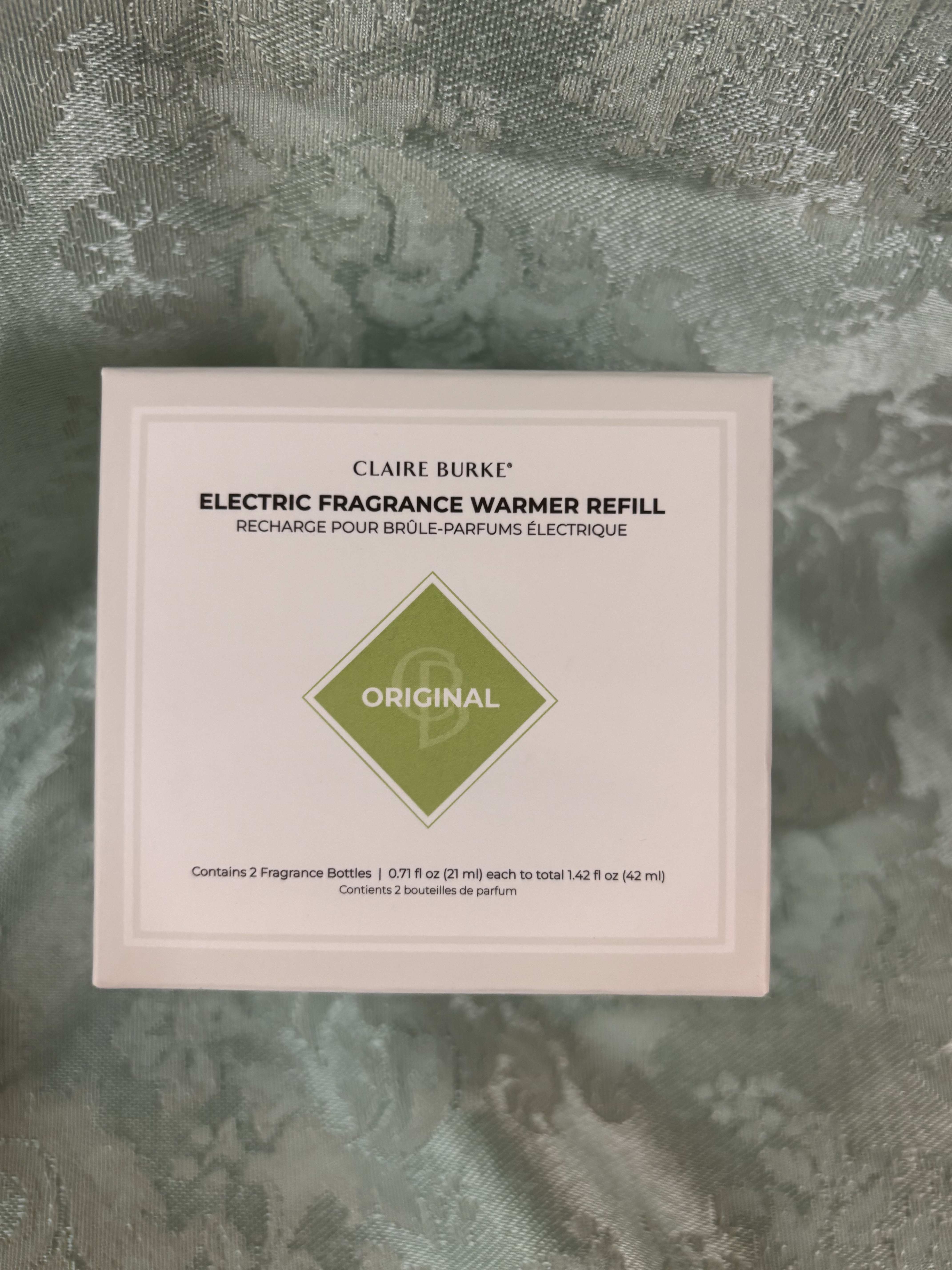 Box of Claire Burke electric fragrance warmer refill