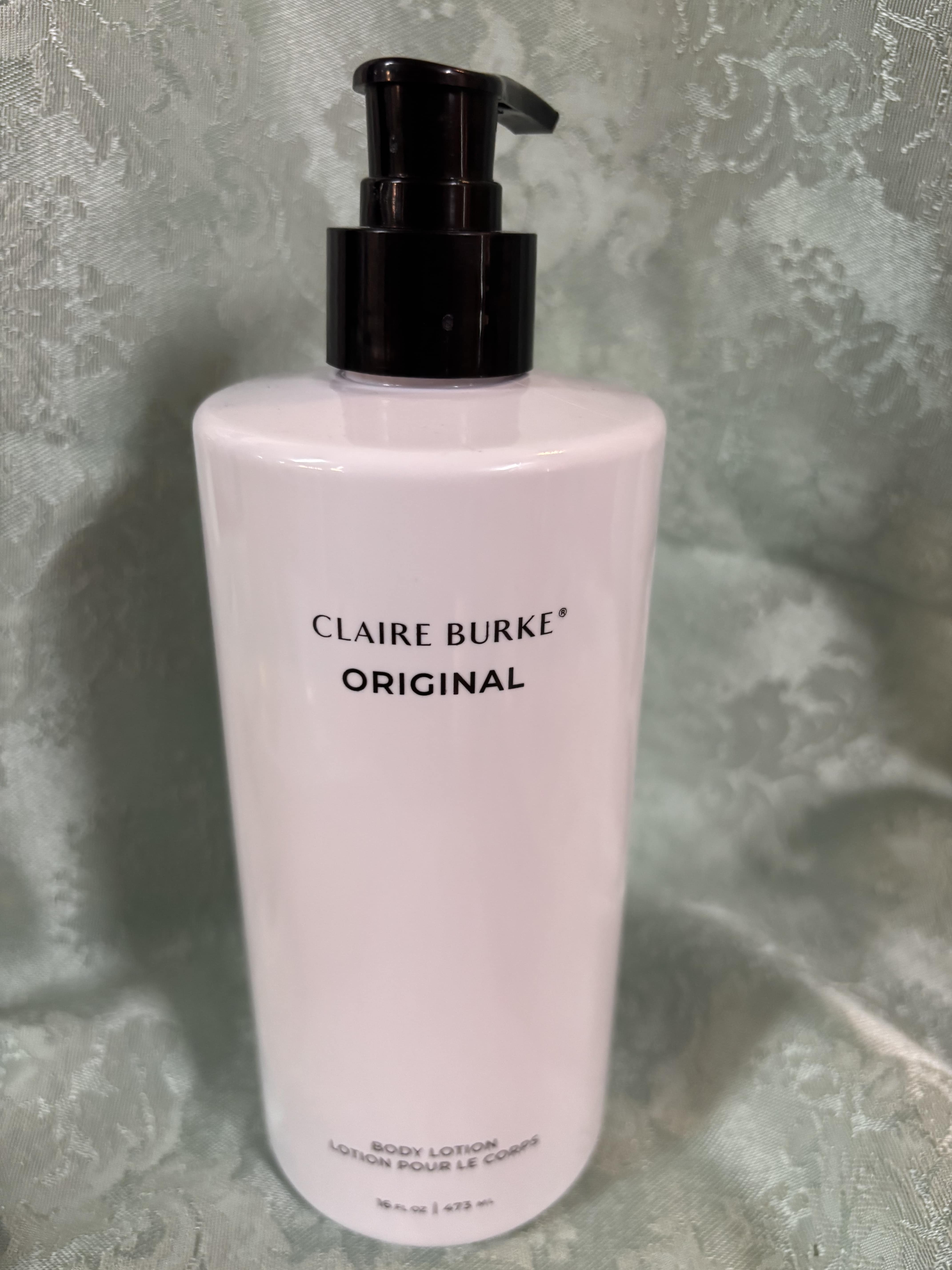 Pink body lotion bottle with a black pump dispenser