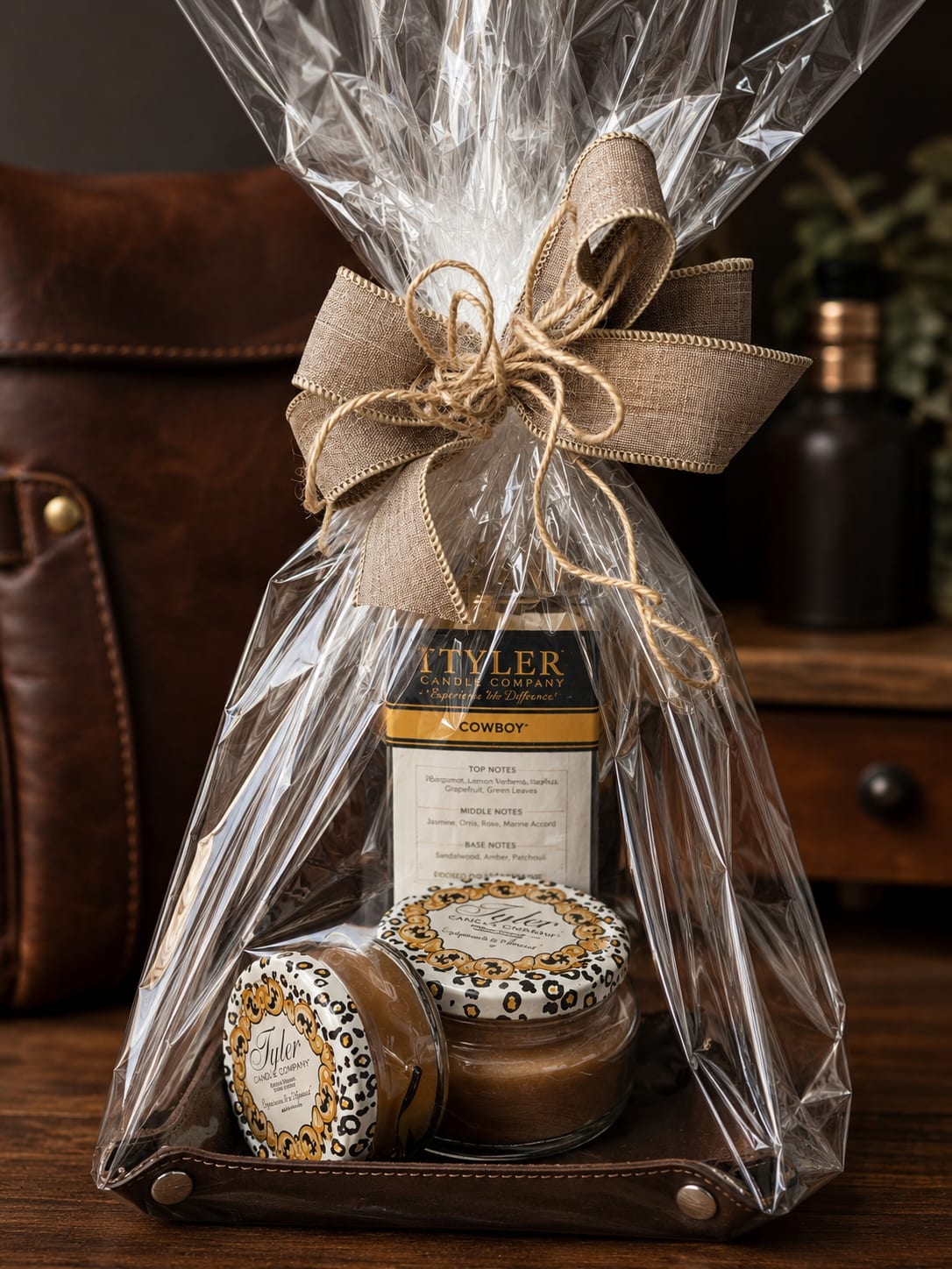 Cowboy gift set - YEEHAW! A masculine fragranced gift set for the gentleman! Includes Tyler's fragrance "Cowboy" (loaded with the aroma of leather!) Candles, and Auto fragrance in a Catch all leather tray inscribed with Babe Ruth's famous saying.