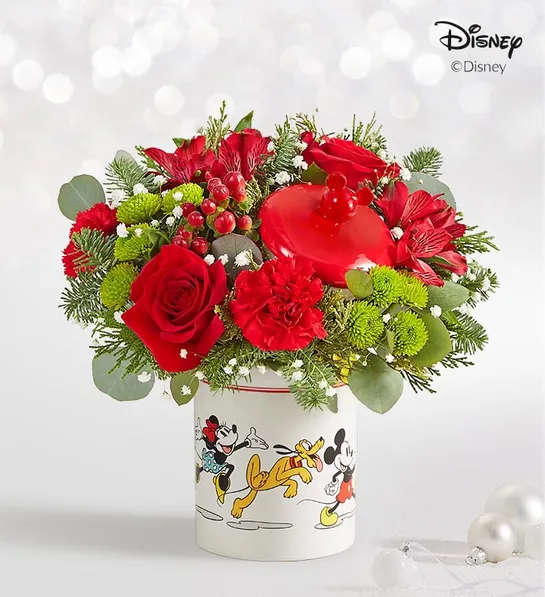 Red floral arrangement in a Disney Mickey and Friends container