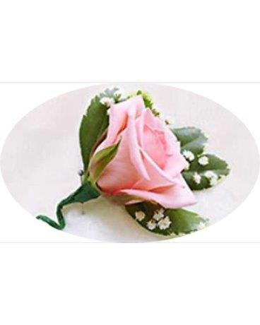 Single pink rose boutonniere with small white filler flowers